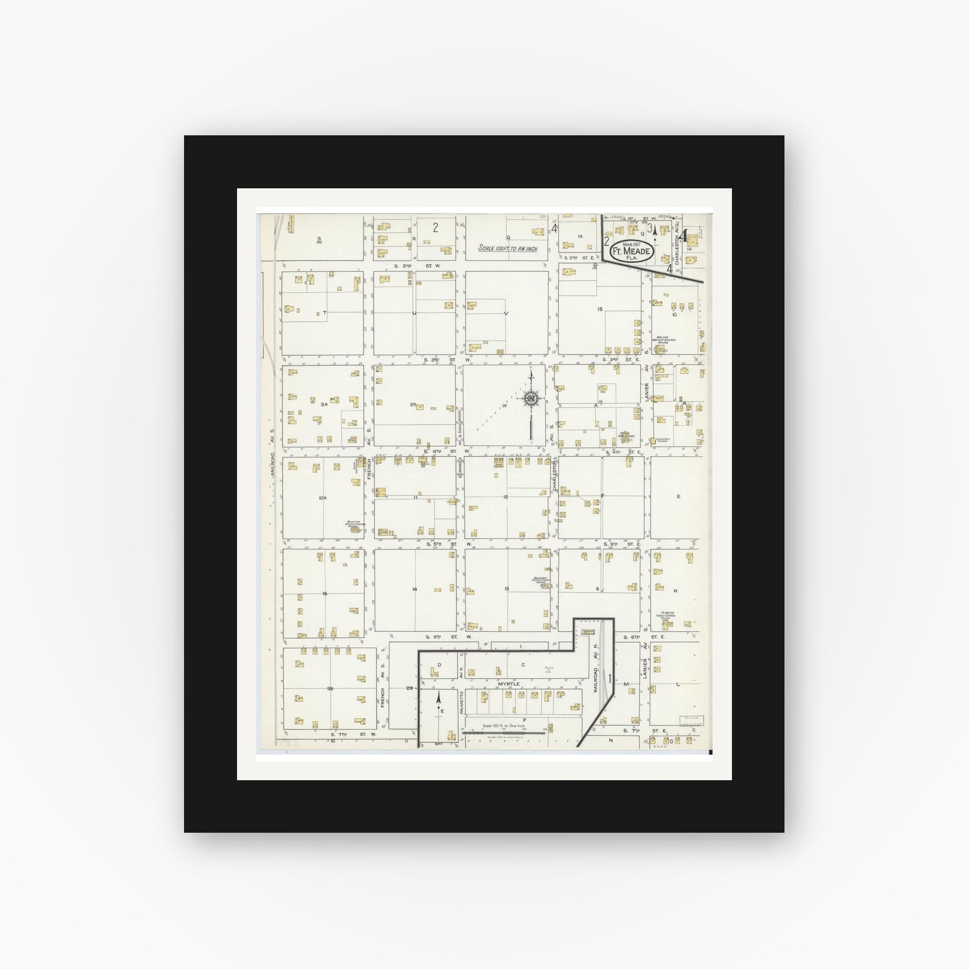 Old map wall art mockup — black gallery frame with white mat — Sanborn Fire Insurance Map from Fort Meade, Polk County, Florida (1917), Sheet #0004