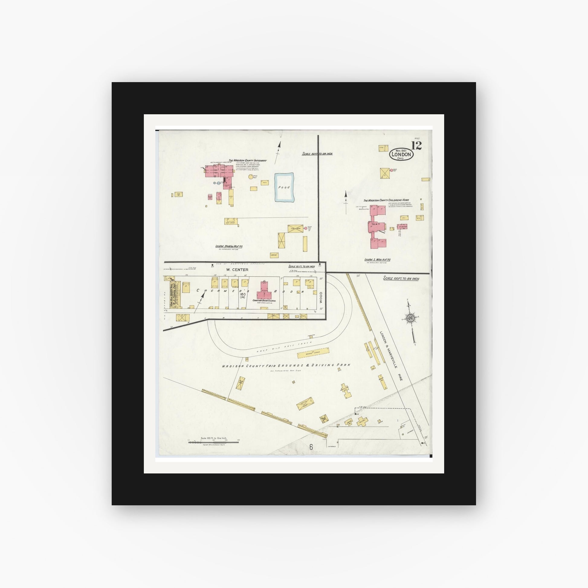 Old map wall art mockup — black gallery frame with white mat — Sanborn Fire Insurance Map from London, Madison County, Ohio (1921), Sheet #0012
