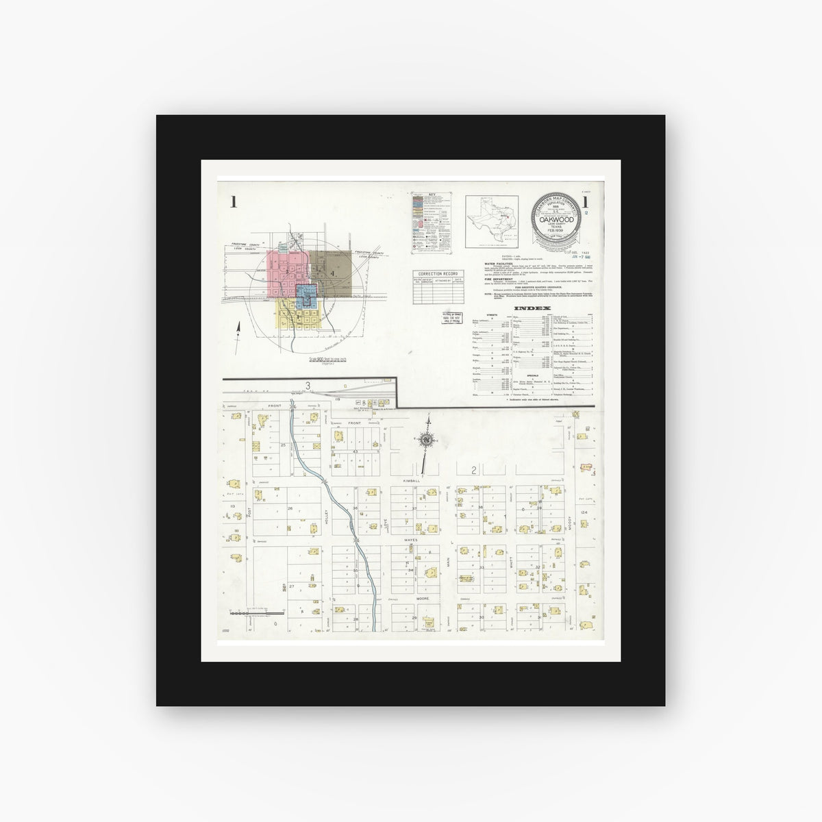 Old map wall art mockup — black gallery frame with white mat — Sanborn Fire Insurance Map from Oakwood, Leon County, Texas (1939), Sheet #0001