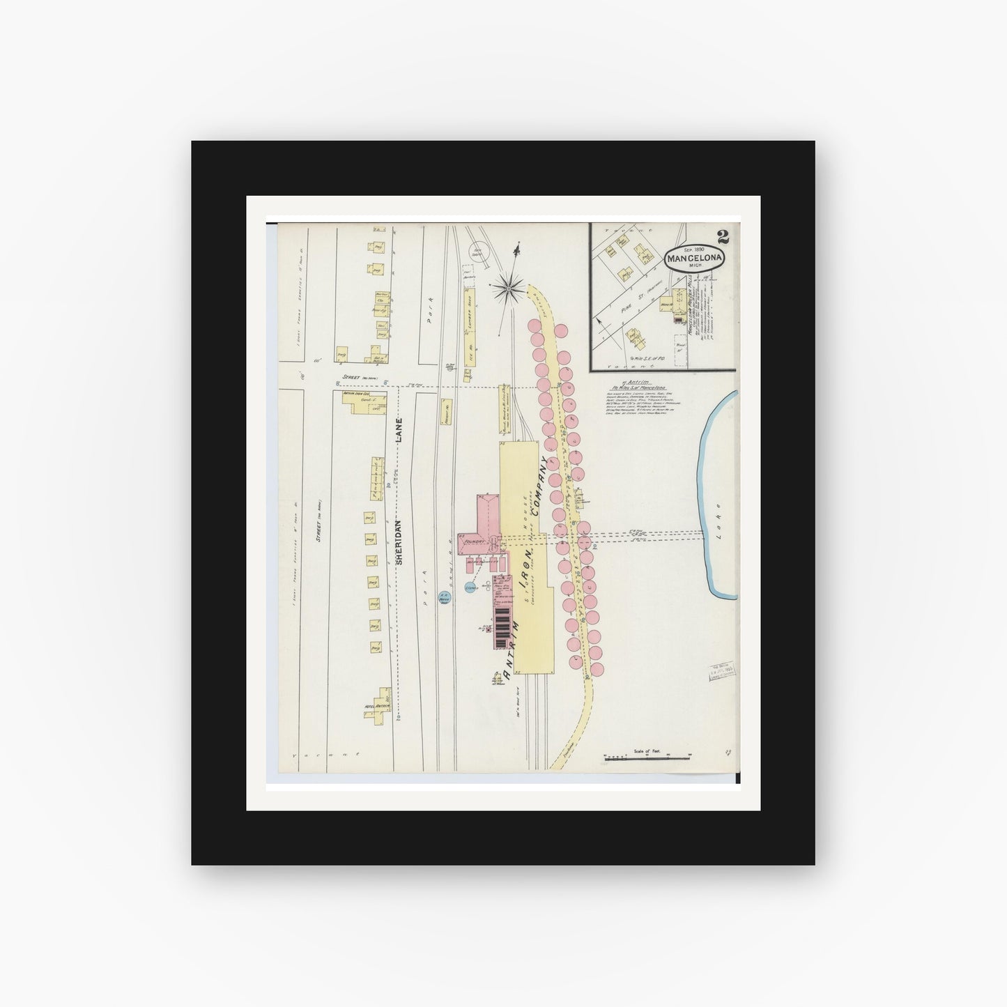 Old map wall art mockup — black gallery frame with white mat — Sanborn Fire Insurance Map from Mancelona, Antrim County, Michigan (1890), Sheet #0002