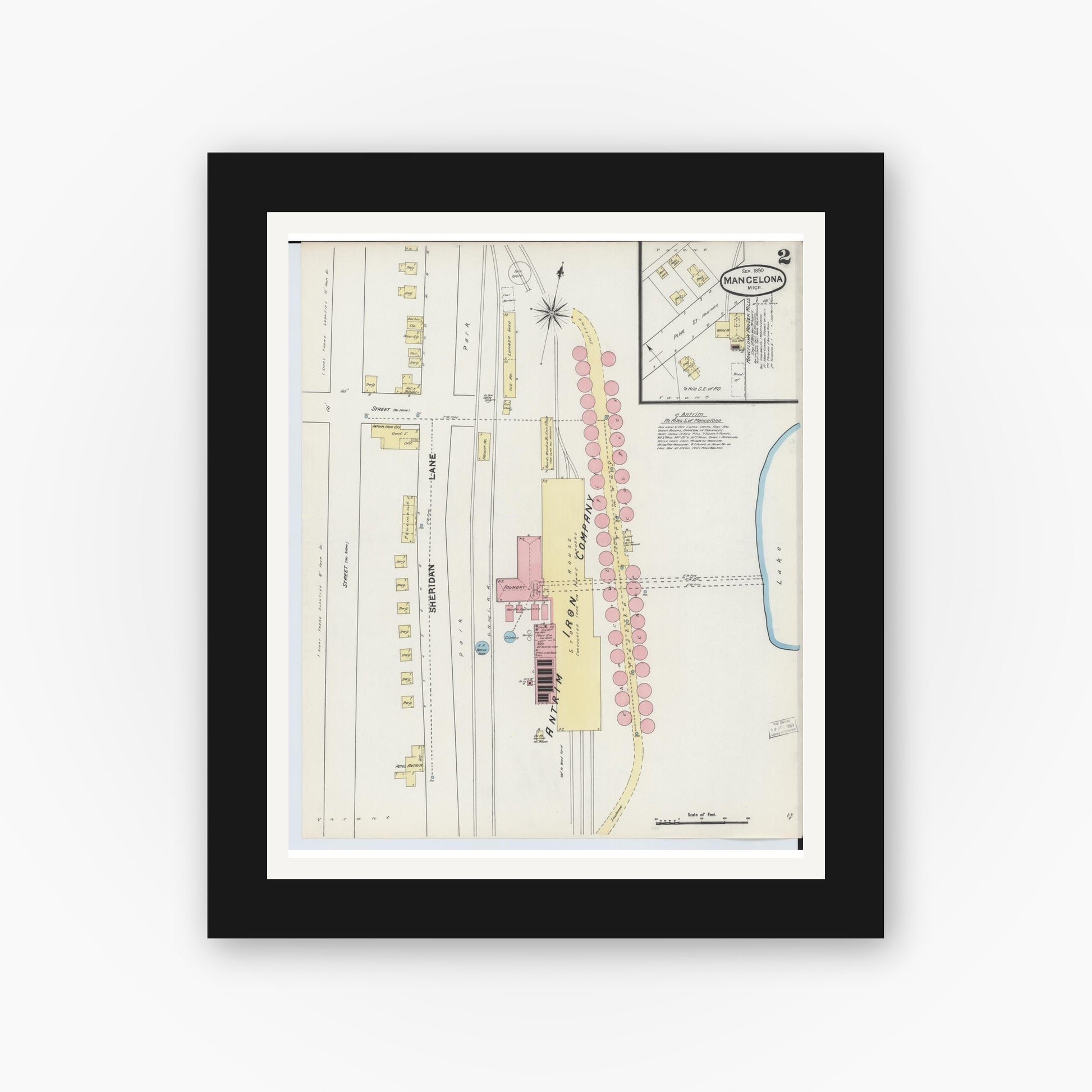 Old map wall art mockup — black gallery frame with white mat — Sanborn Fire Insurance Map from Mancelona, Antrim County, Michigan (1890), Sheet #0002