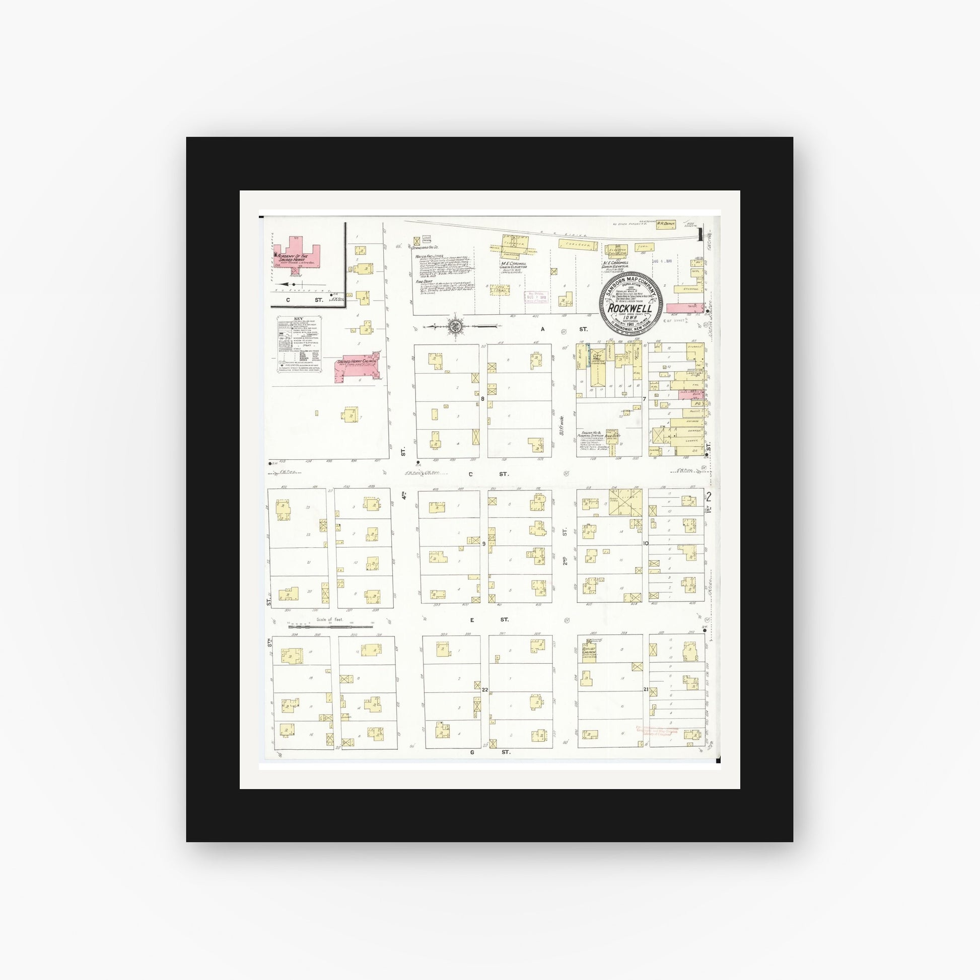 Old map wall art mockup — black gallery frame with white mat — Sanborn Fire Insurance Map from Rockwell, Cerro Gordo County, Iowa (1911), Sheet #0001