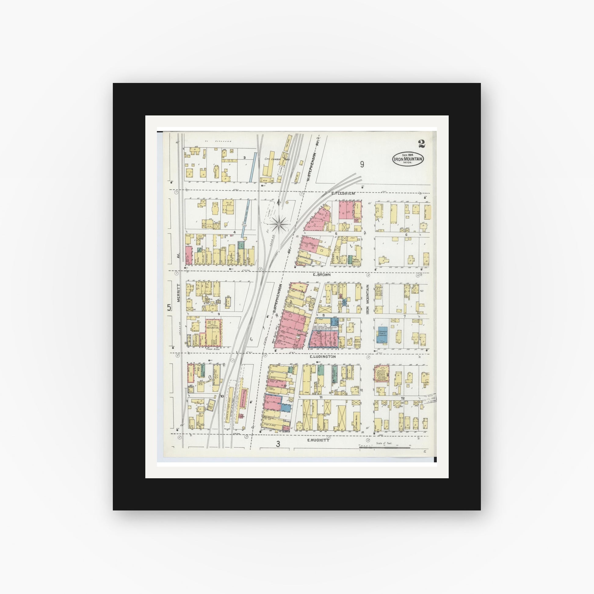 Old map wall art mockup — black gallery frame with white mat — Sanborn Fire Insurance Map from Iron Mountain, Dickinson County, Michigan (1904), Sheet #0002