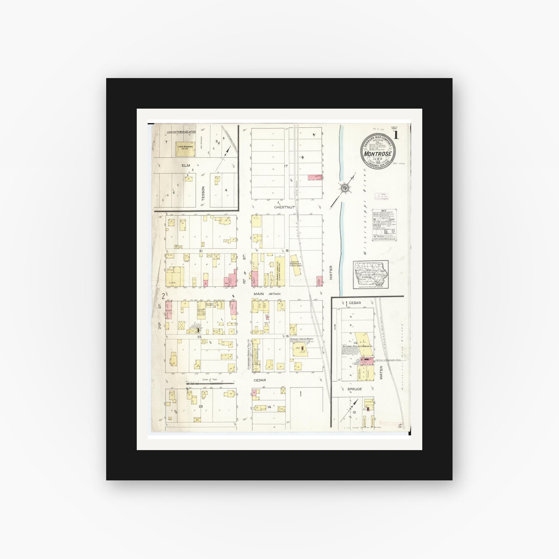 Old map wall art mockup — black gallery frame with white mat — Sanborn Fire Insurance Map from Montrose, Lee County, Iowa (1913) â€” Complete Set