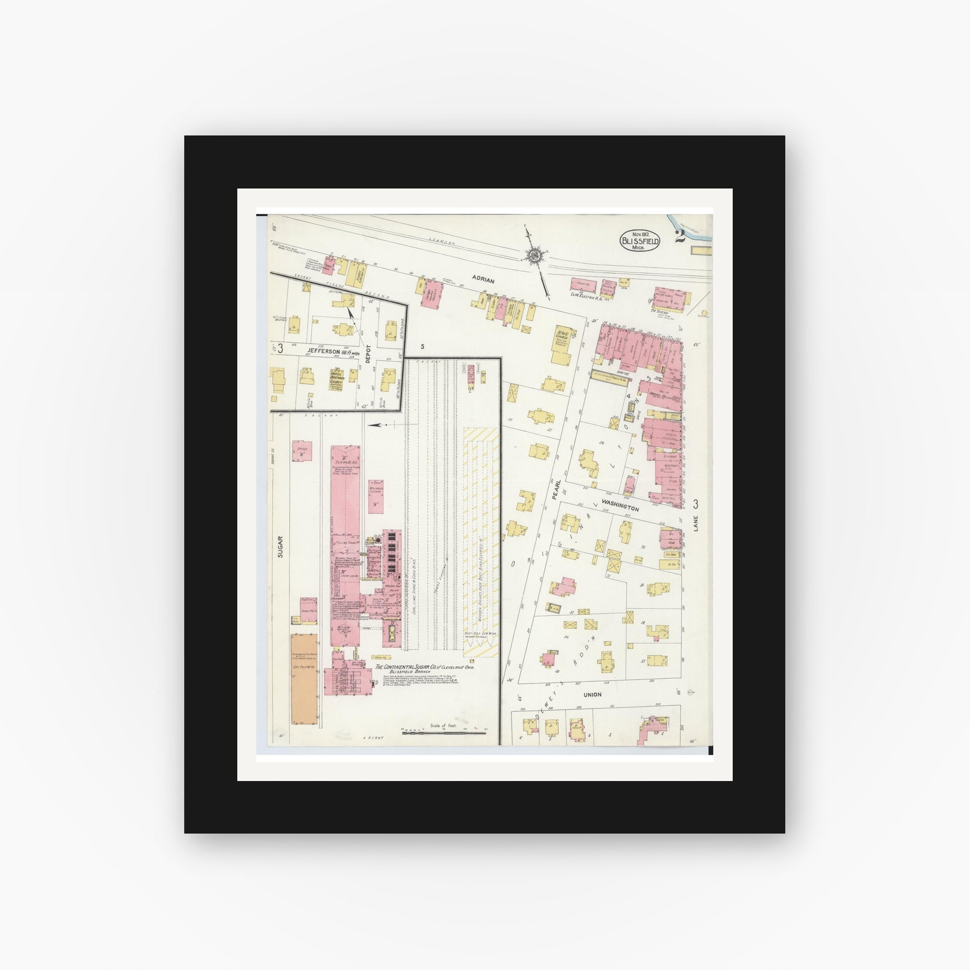 Old map wall art mockup — black gallery frame with white mat — Sanborn Fire Insurance Map from Blissfield, Lenawee County, Michigan (1912), Sheet #0002