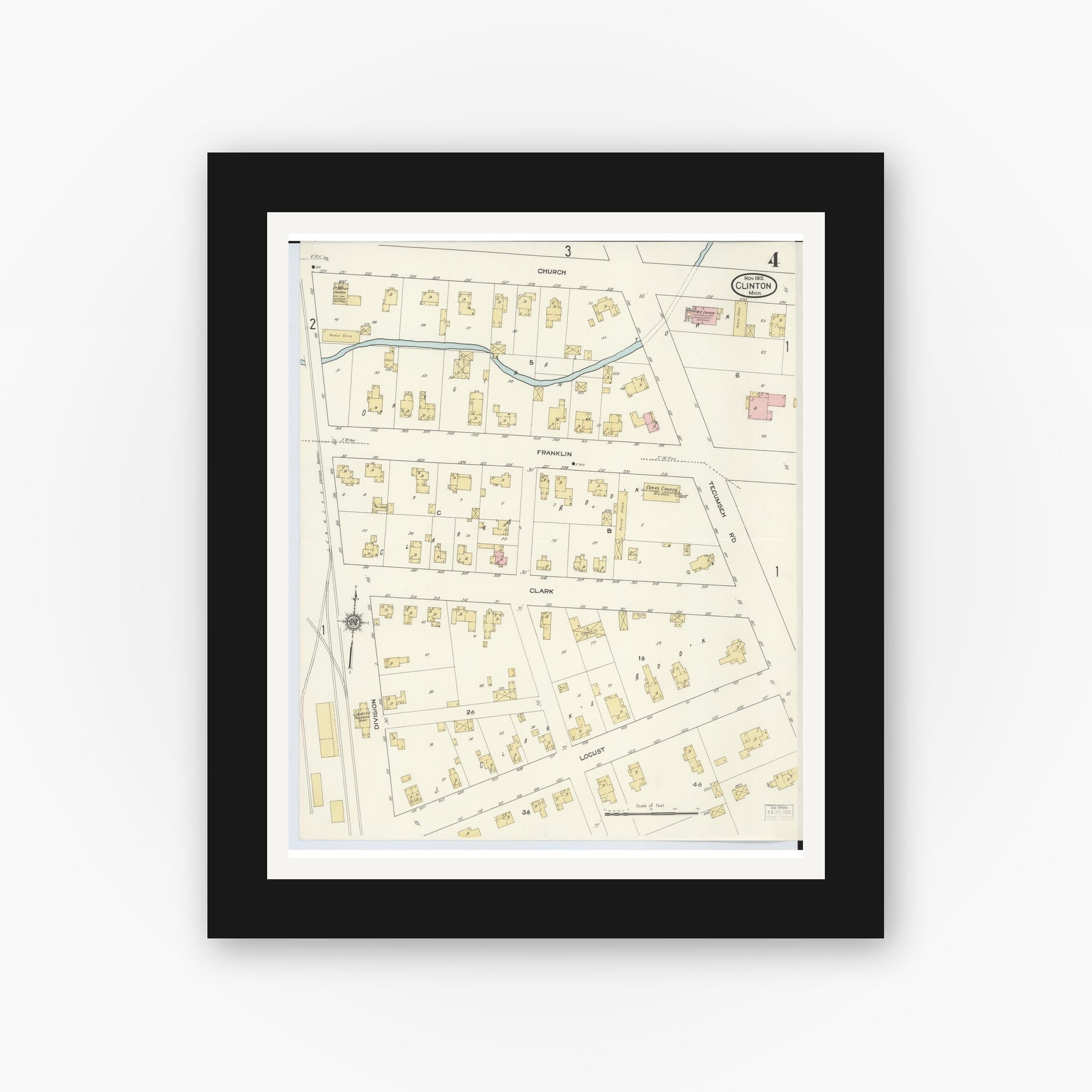 Old map wall art mockup — black gallery frame with white mat — Sanborn Fire Insurance Map from Clinton, Lenawee County, Michigan (1912), Sheet #0004