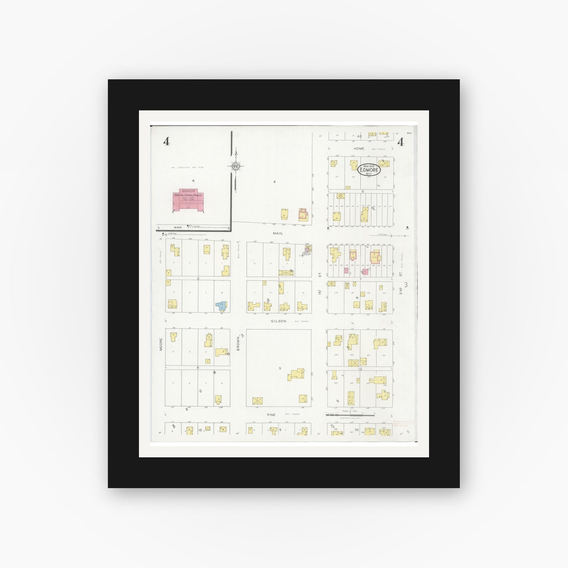 Old map wall art mockup — black gallery frame with white mat — Sanborn Fire Insurance Map from Edmore, Montcalm County, Michigan (1929), Sheet #0004