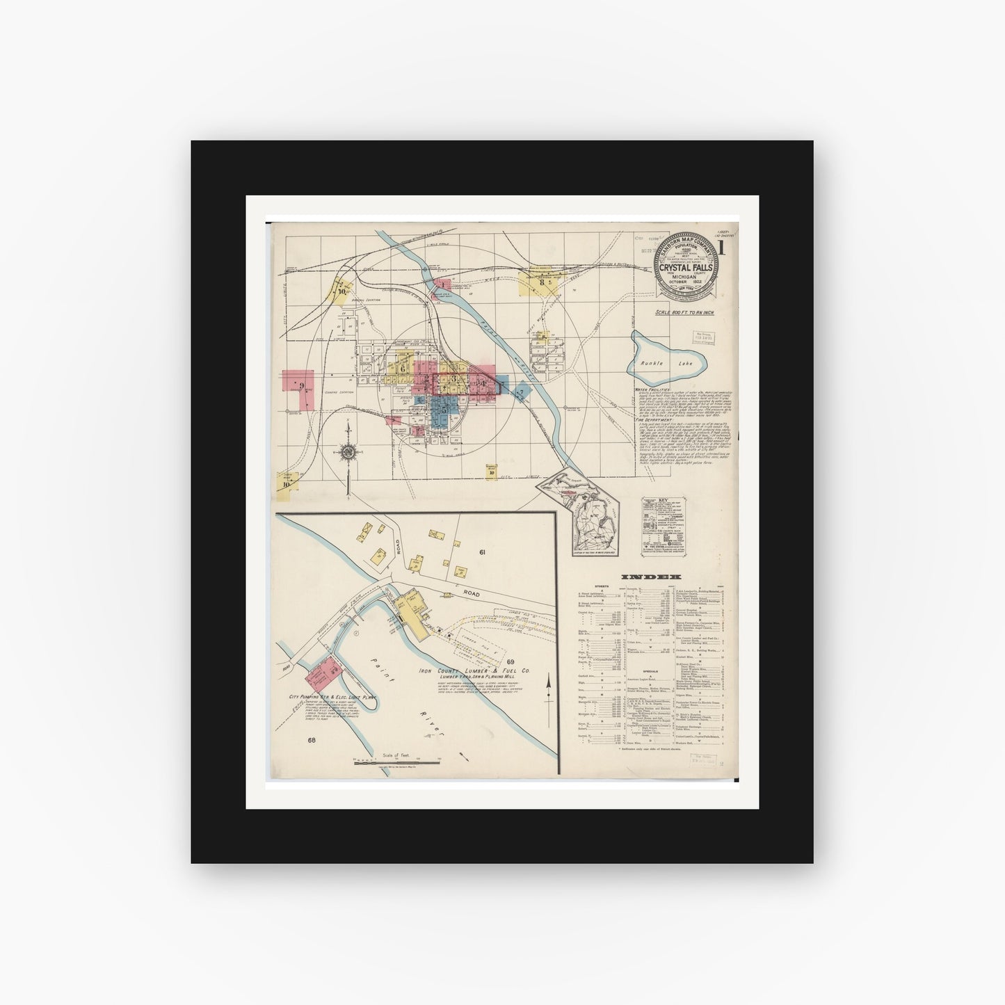 Old map wall art mockup — black gallery frame with white mat — Sanborn Fire Insurance Map from Crystal Falls, Iron County, Michigan (1922), Sheet #0001