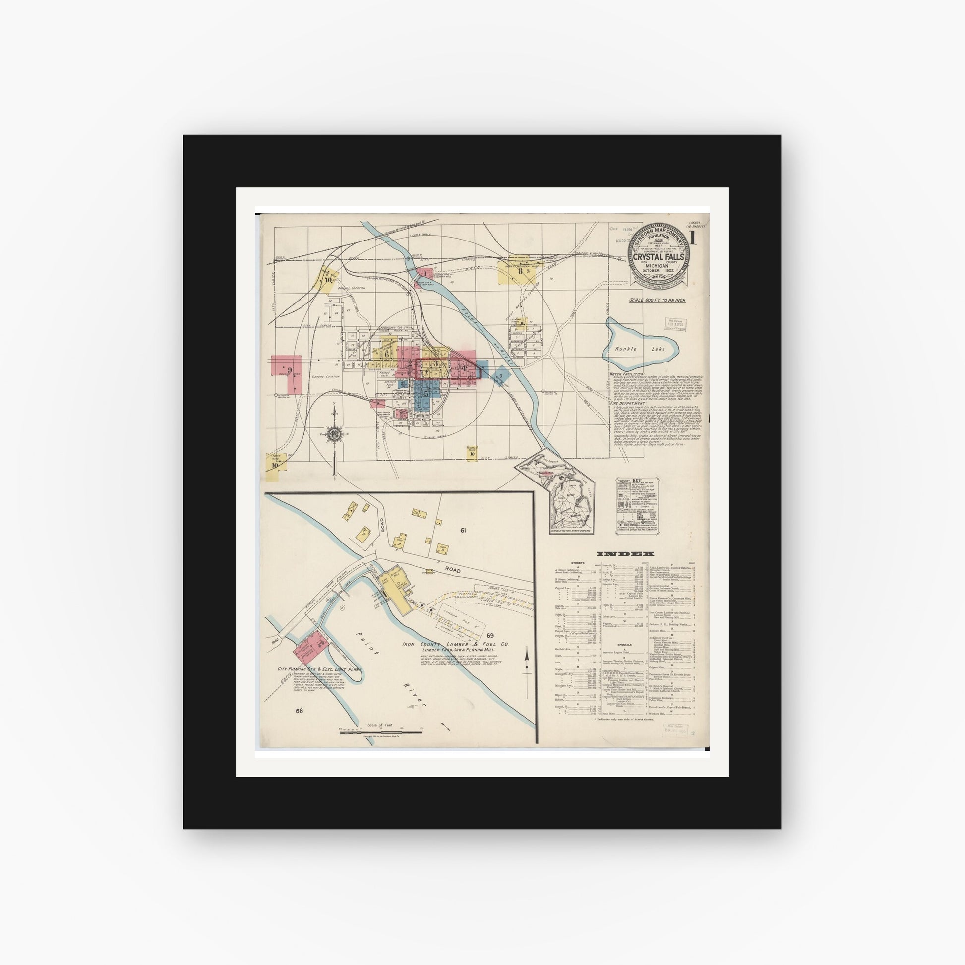 Old map wall art mockup — black gallery frame with white mat — Sanborn Fire Insurance Map from Crystal Falls, Iron County, Michigan (1922), Sheet #0001