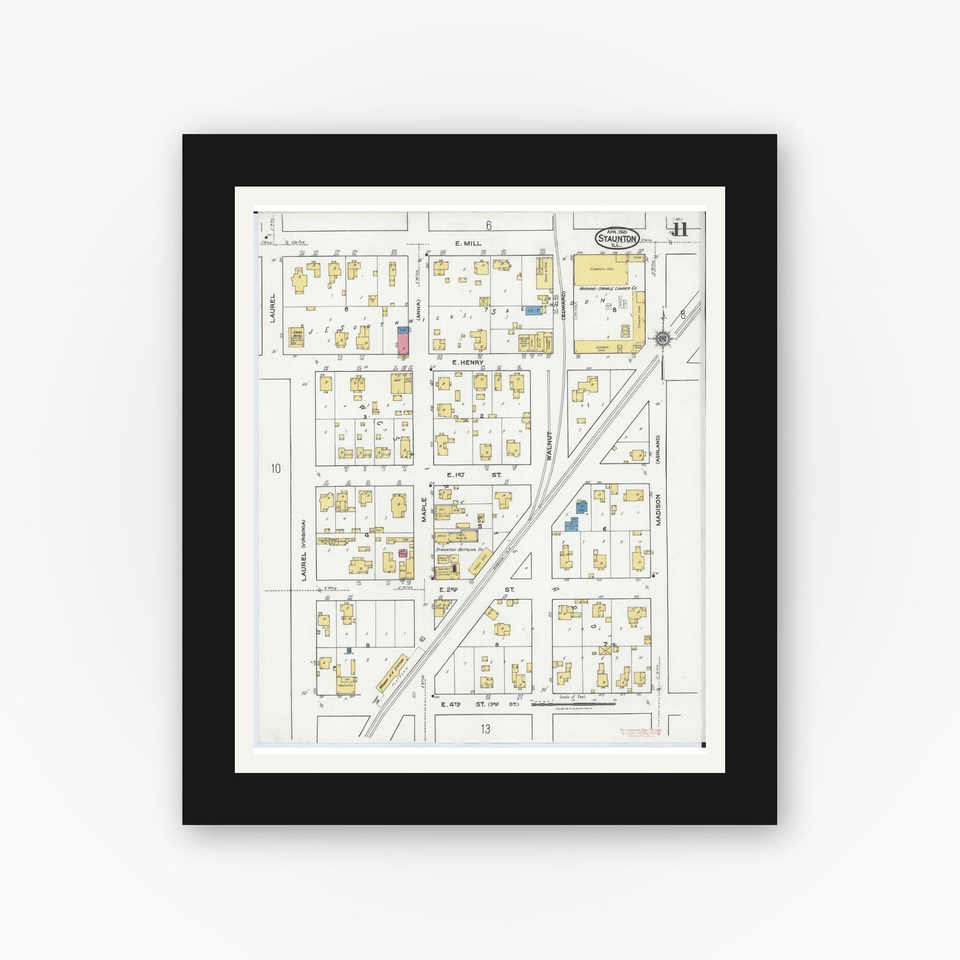 Old map wall art mockup — black gallery frame with white mat — Sanborn Fire Insurance Map from Staunton, Macoupin County, Illinois (1921), Sheet #0011