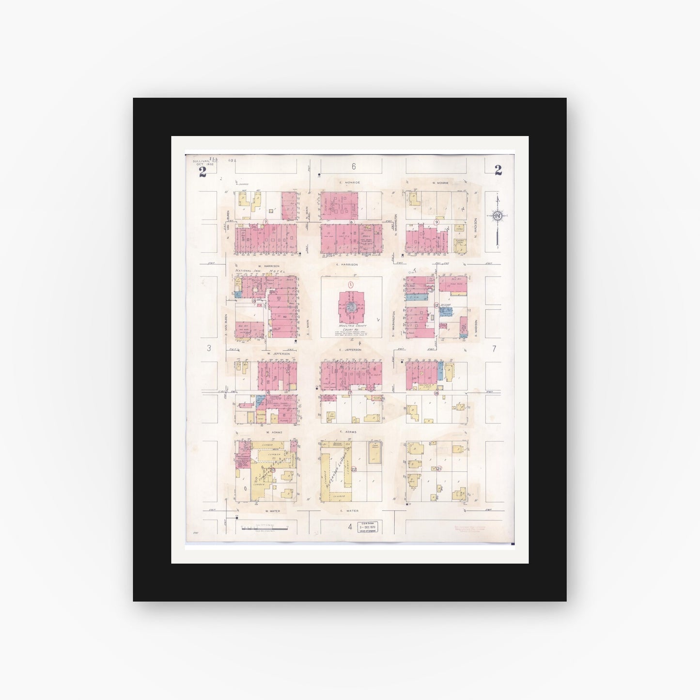 Old map wall art mockup — black gallery frame with white mat — Sanborn Fire Insurance Map from Sullivan, Moultrie County, Illinois (1940), Sheet #0002
