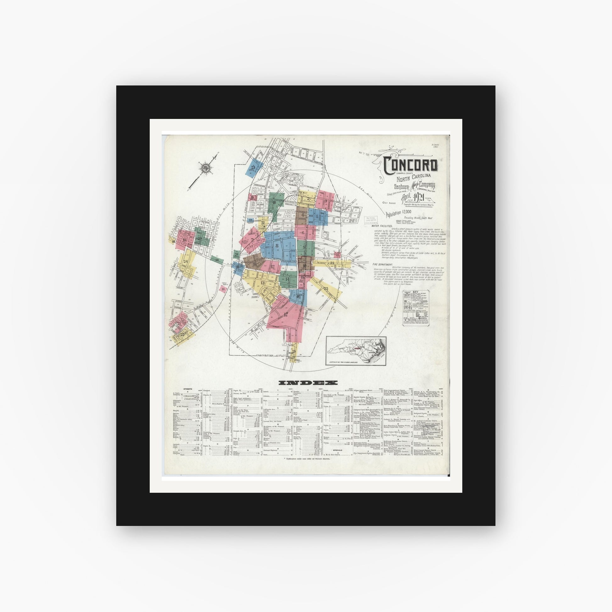 Old map wall art mockup — black gallery frame with white mat — Sanborn Fire Insurance Map from Concord, Cabarrus County, North Carolina (1921) - Complete Map Set