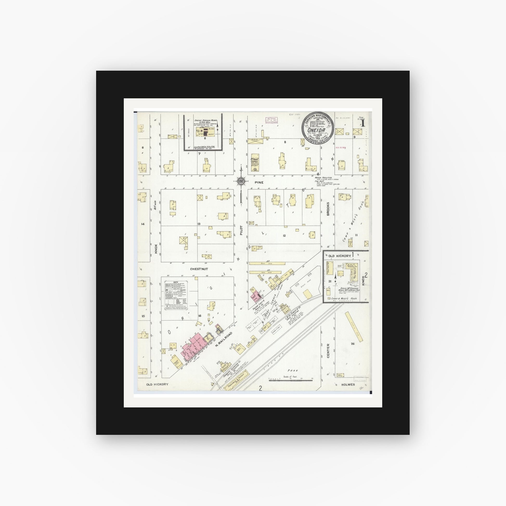Old map wall art mockup — black gallery frame with white mat — Sanborn Fire Insurance Map from Oneida, Knox County, Illinois (1910), Sheet #0001