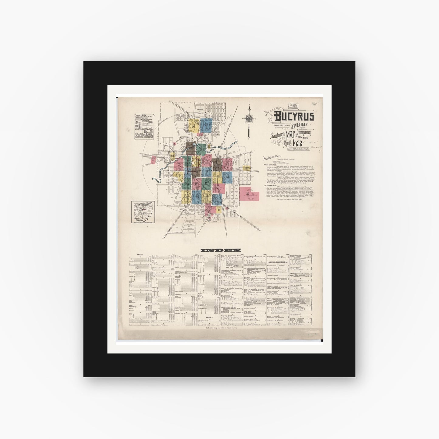 Old map wall art mockup — black gallery frame with white mat — Sanborn Fire Insurance Map from Bucyrus, Crawford County, Ohio (1922), Sheet #0001