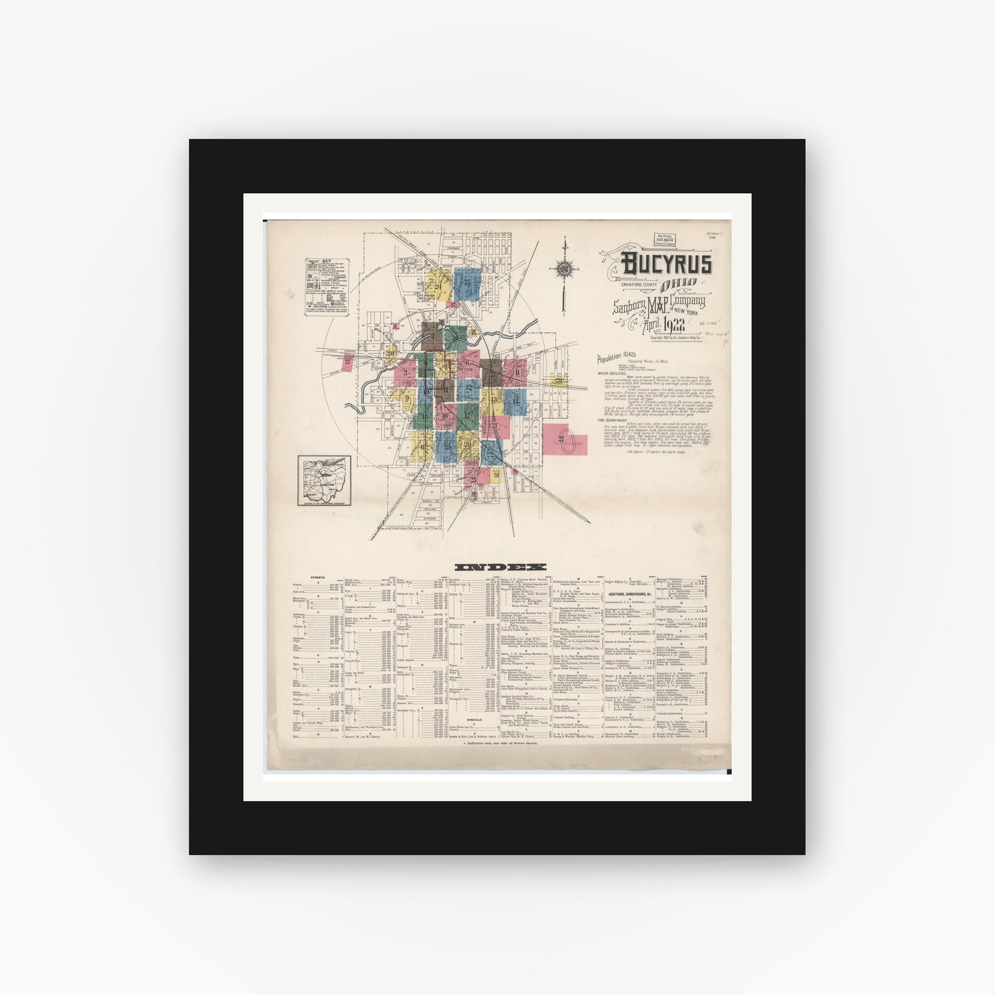 Old map wall art mockup — black gallery frame with white mat — Sanborn Fire Insurance Map from Bucyrus, Crawford County, Ohio (1922), Sheet #0001