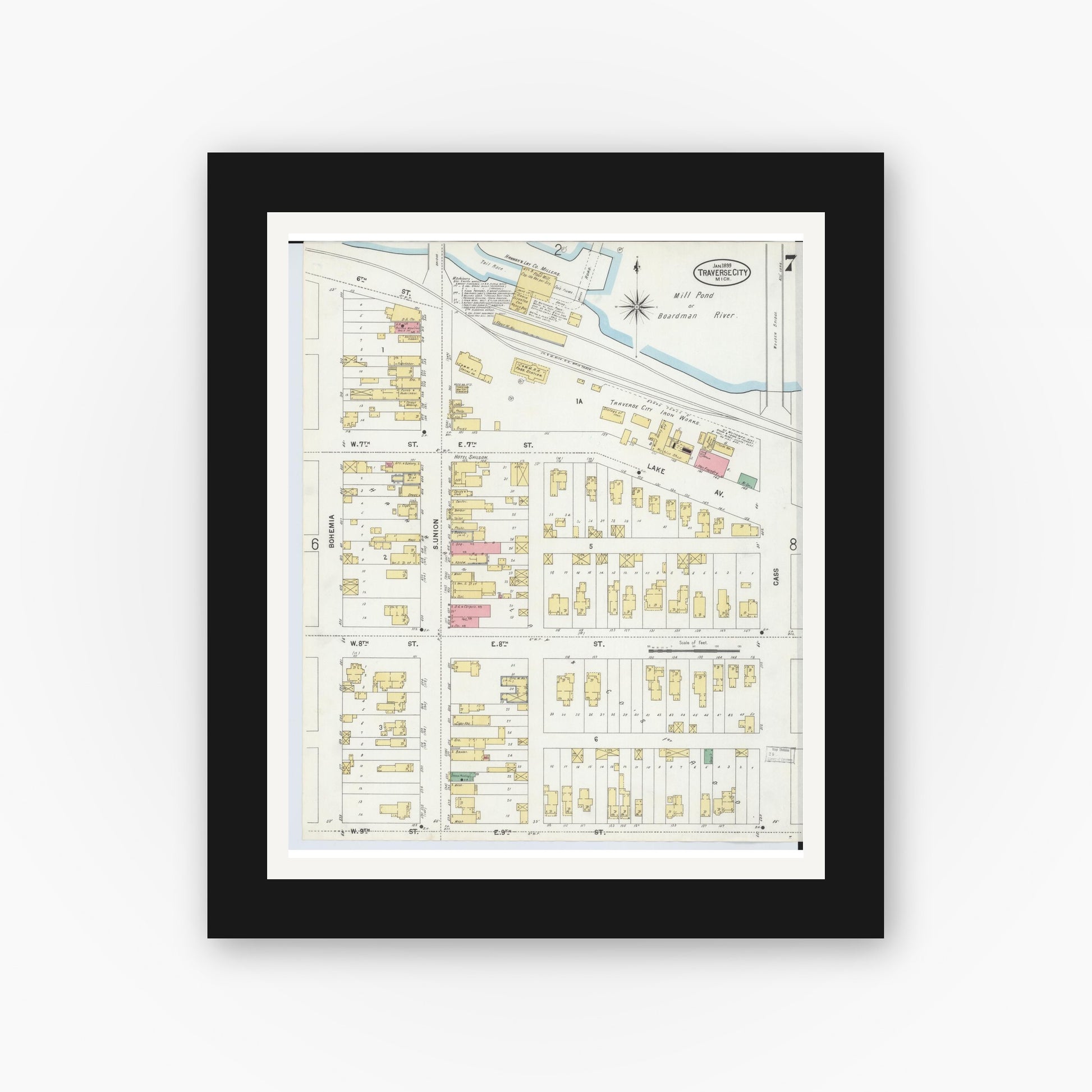 Old map wall art mockup — black gallery frame with white mat — Sanborn Fire Insurance Map from Traverse City, Grand Traverse County, Michigan (1899), Sheet #0007