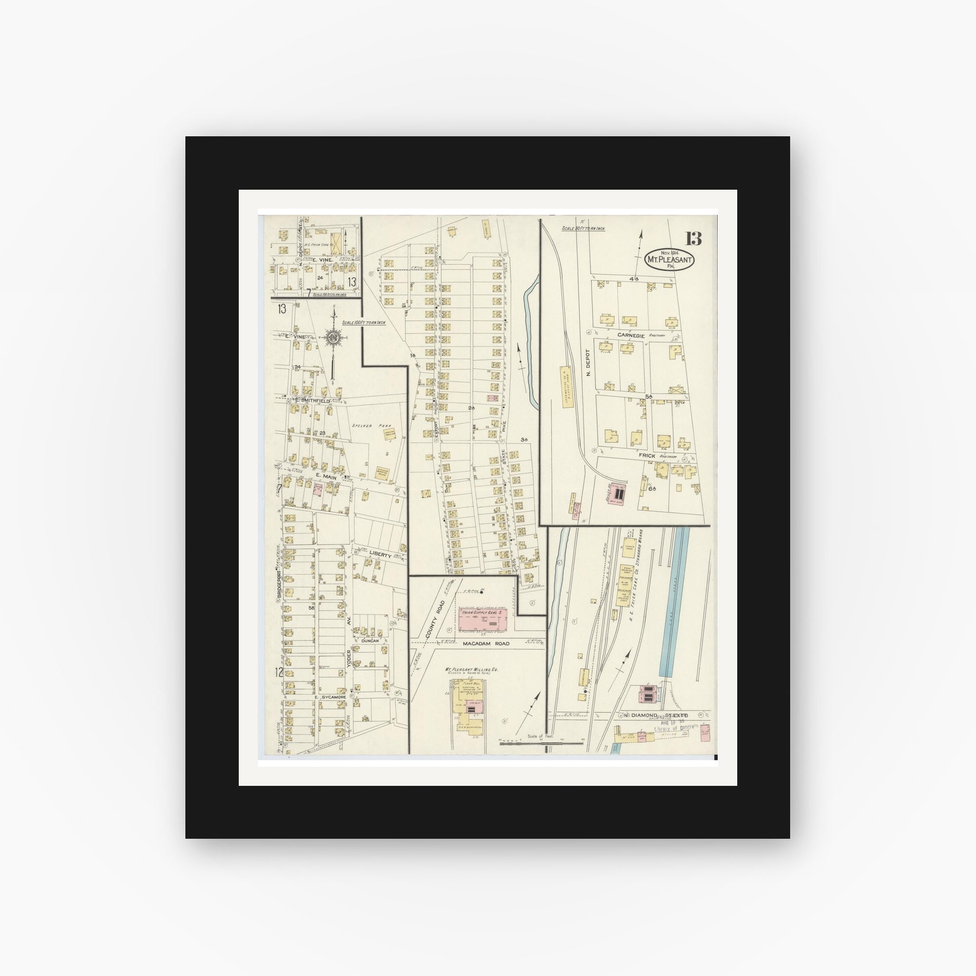 Old map wall art mockup — black gallery frame with white mat — Sanborn Fire Insurance Map from Mount Pleasant, Westmoreland County, Pennsylvania (1914), Sheet #0013