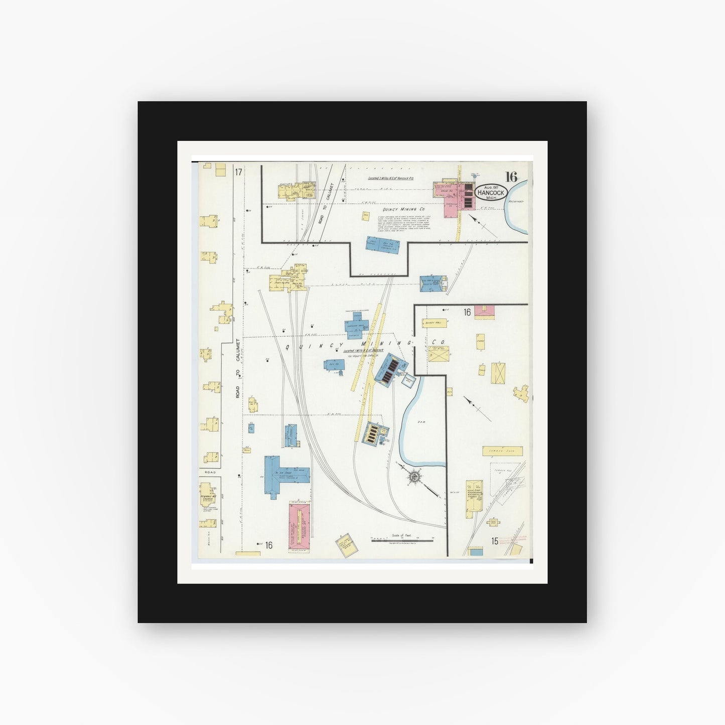 Old map wall art mockup — black gallery frame with white mat — Sanborn Fire Insurance Map from Hancock, Houghton County, Michigan (1917), Sheet #0016