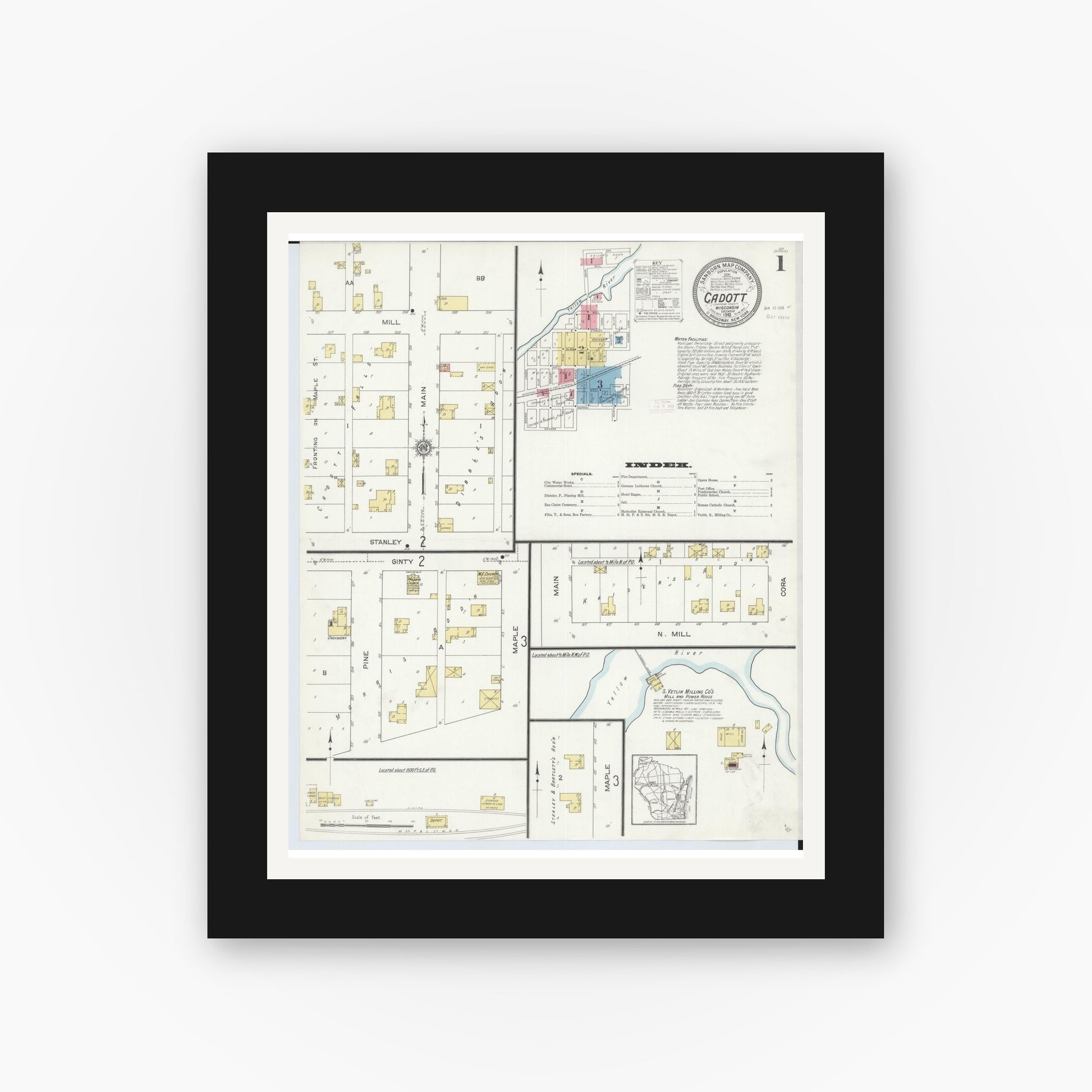 Old map wall art mockup — black gallery frame with white mat — Sanborn Fire Insurance Map from Cadott, Chippewa County, Wisconsin (1912), Sheet #0001