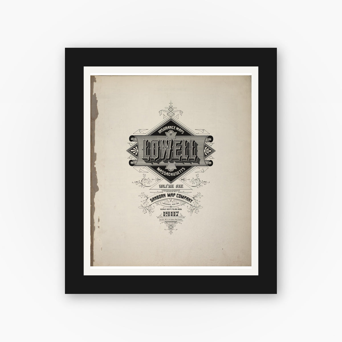 Old map wall art mockup — black gallery frame with white mat — Sanborn Fire Insurance Map from Lowell, Middlesex County, Massachusetts (1907), Sheet #0001