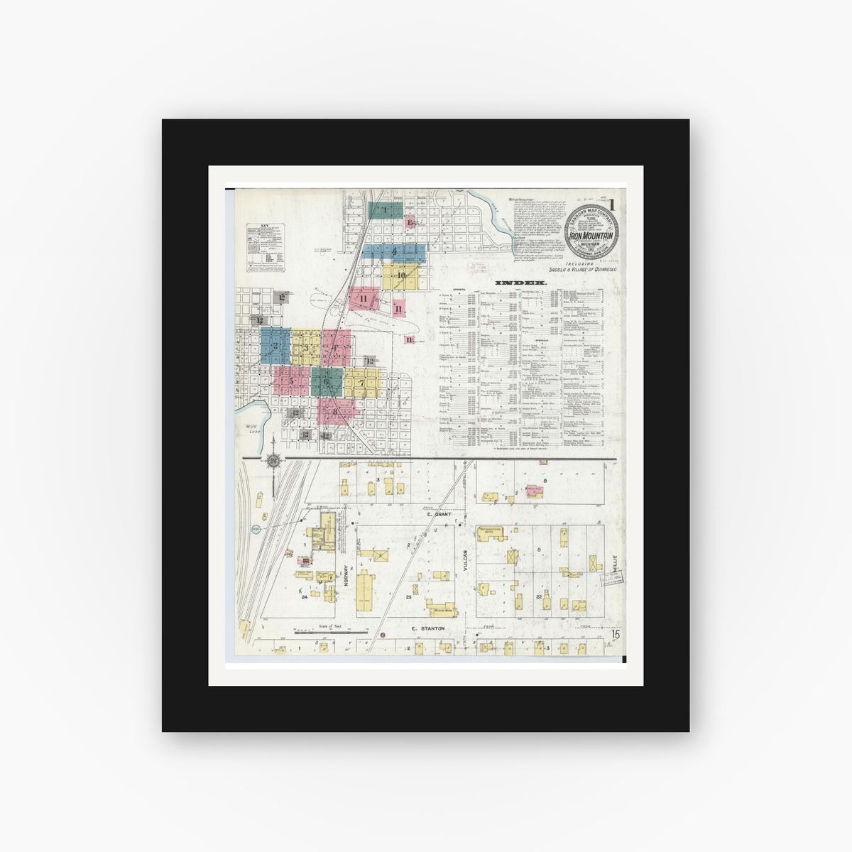 Old map wall art mockup — black gallery frame with white mat — Sanborn Fire Insurance Map from Iron Mountain, Dickinson County, Michigan (1911), Sheet #0001