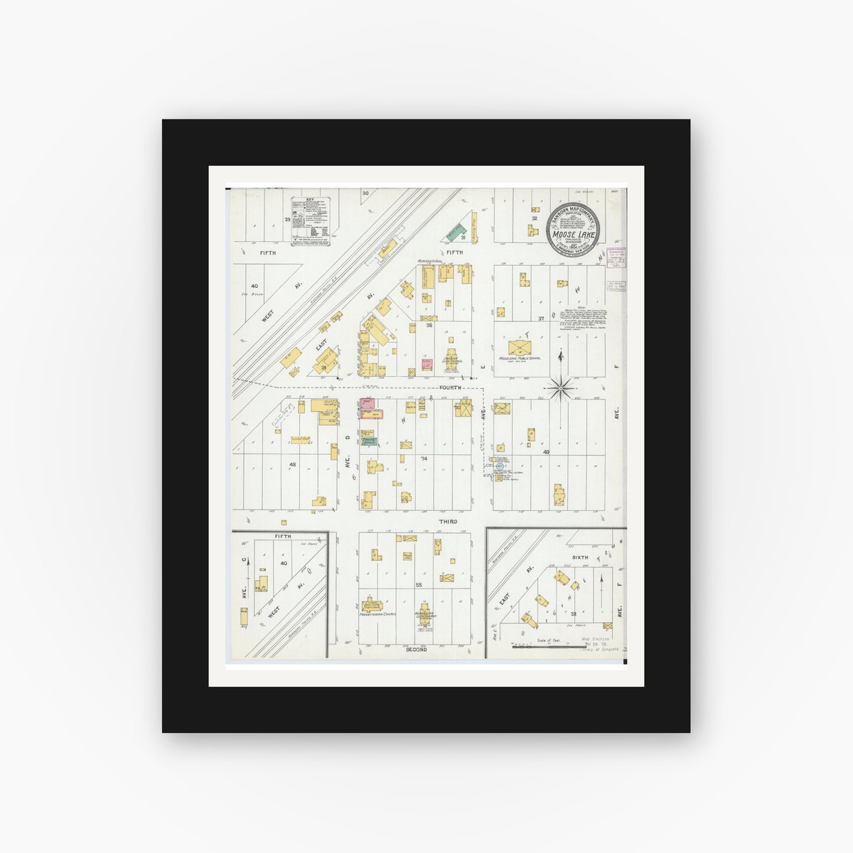 Old map wall art mockup — black gallery frame with white mat — Sanborn Fire Insurance Map from Moose Lake, Carlton County, Minnesota (1904), Sheet #0001