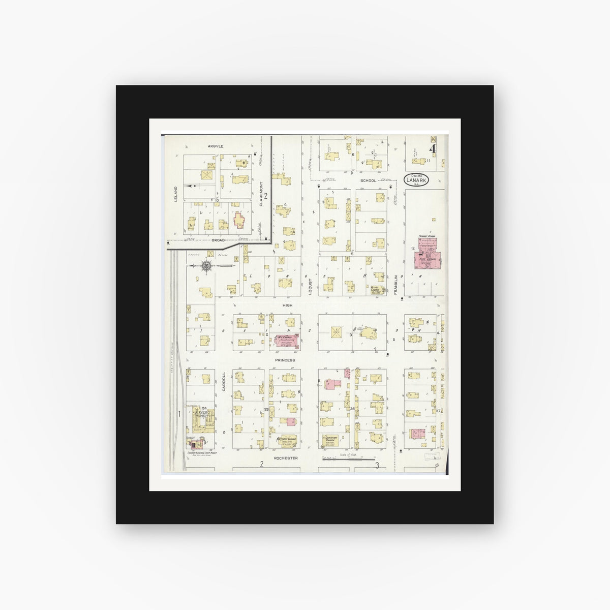 Old map wall art mockup — black gallery frame with white mat — Sanborn Fire Insurance Map from Lanark, Carroll County, Illinois (1912), Sheet #0004
