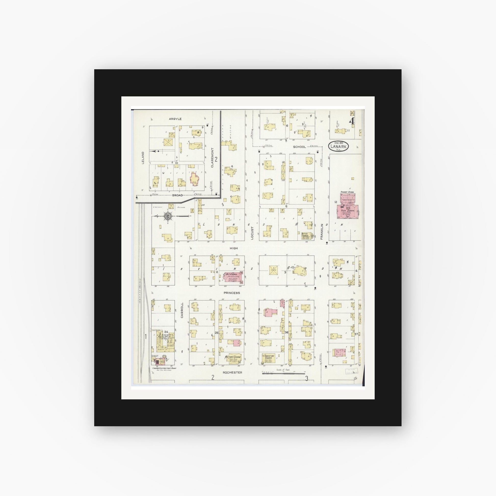Old map wall art mockup — black gallery frame with white mat — Sanborn Fire Insurance Map from Lanark, Carroll County, Illinois (1912), Sheet #0004