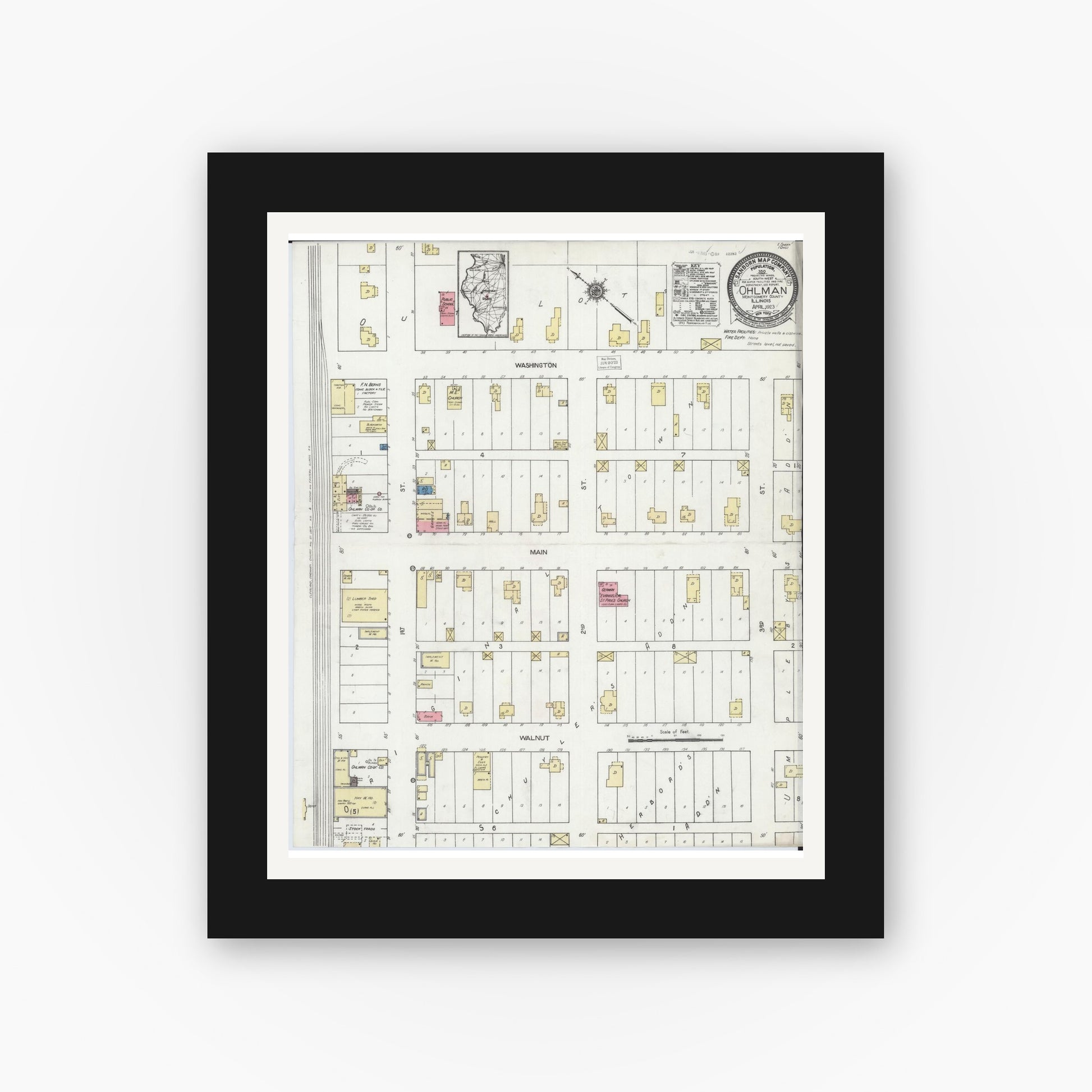Old map wall art mockup — black gallery frame with white mat — Sanborn Fire Insurance Map from Ohlman, Montgomery County, Illinois (1923), Sheet #0001