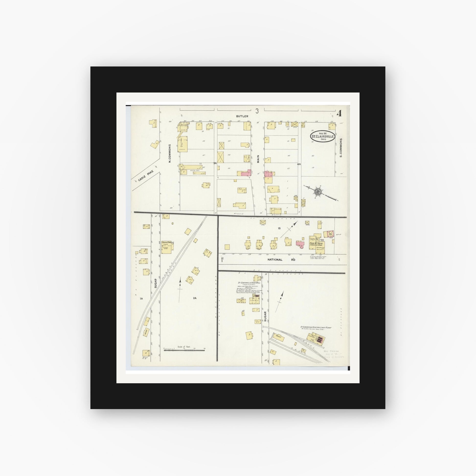 Old map wall art mockup — black gallery frame with white mat — Sanborn Fire Insurance Map from Saint Clairsville, Belmont County, Ohio (1911), Sheet #0004