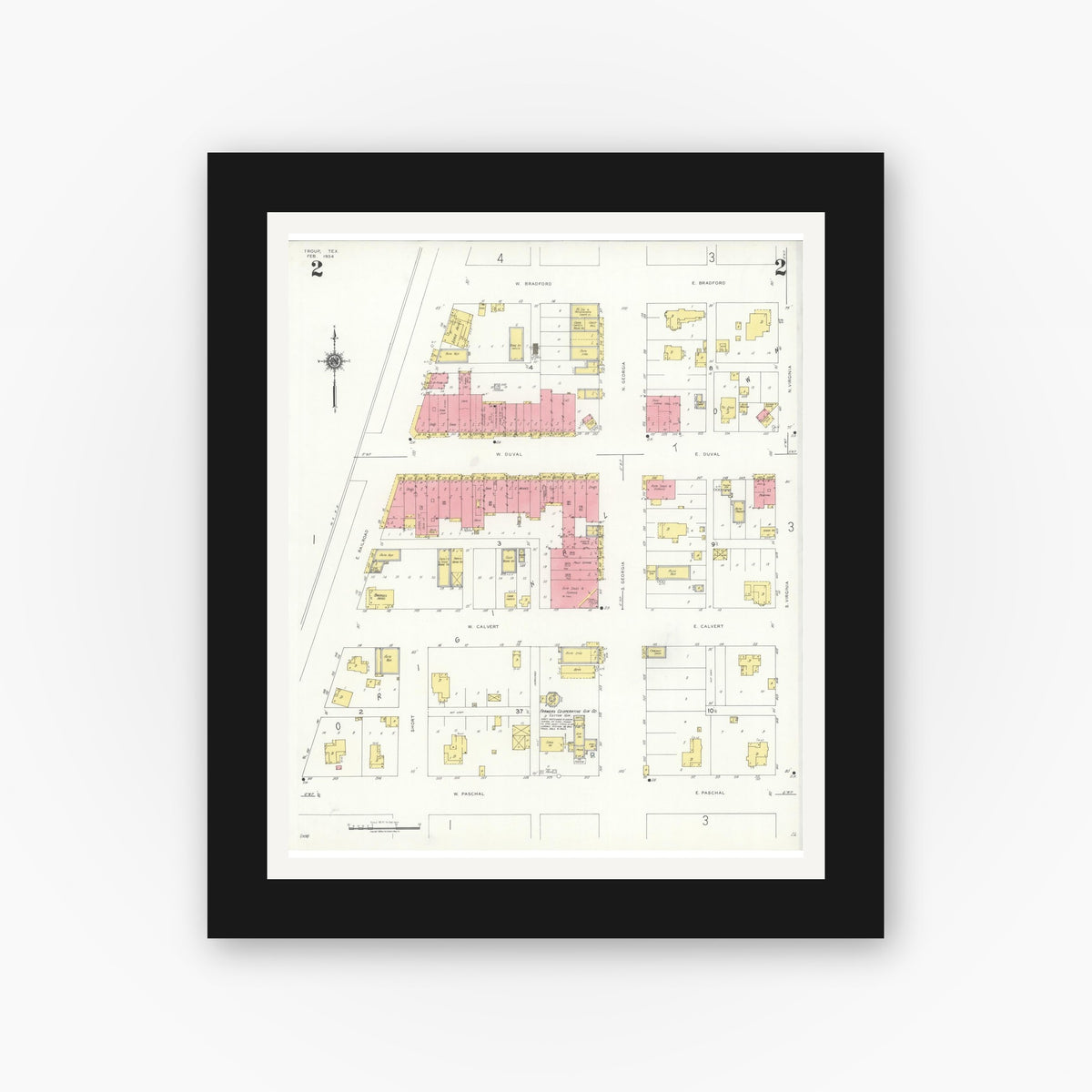 Old map wall art mockup — black gallery frame with white mat — Sanborn Fire Insurance Map from Troup, Smith County, Texas (1934), Sheet #0002