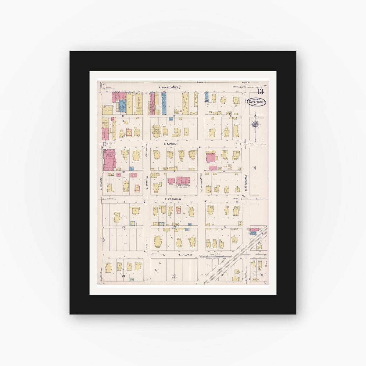 Old map wall art mockup — black gallery frame with white mat — Sanborn Fire Insurance Map from Taylorville, Christian County, Illinois (1922), Sheet #0013