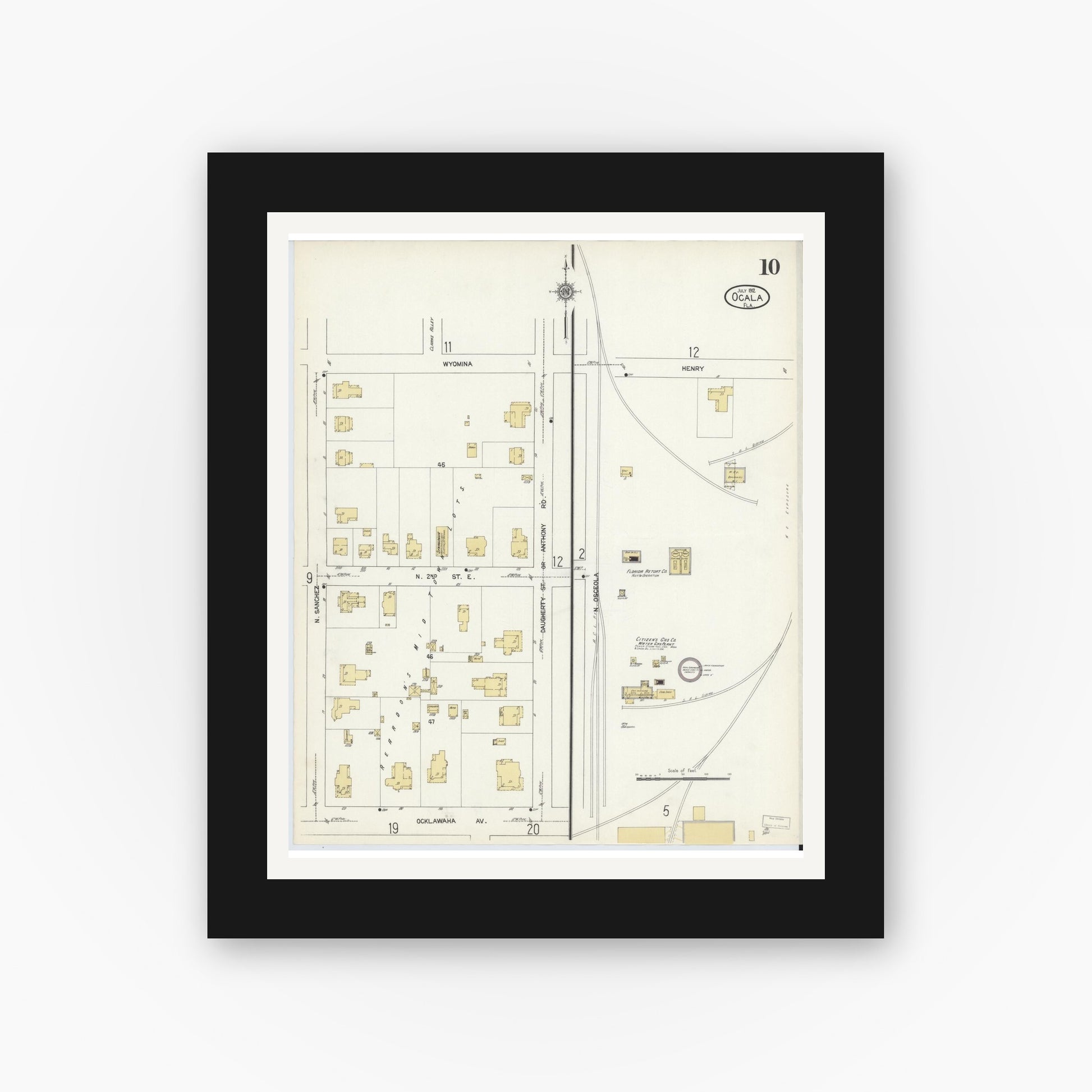 Old map wall art mockup — black gallery frame with white mat — Sanborn Fire Insurance Map from Ocala, Marion County, Florida (1912), Sheet #0010