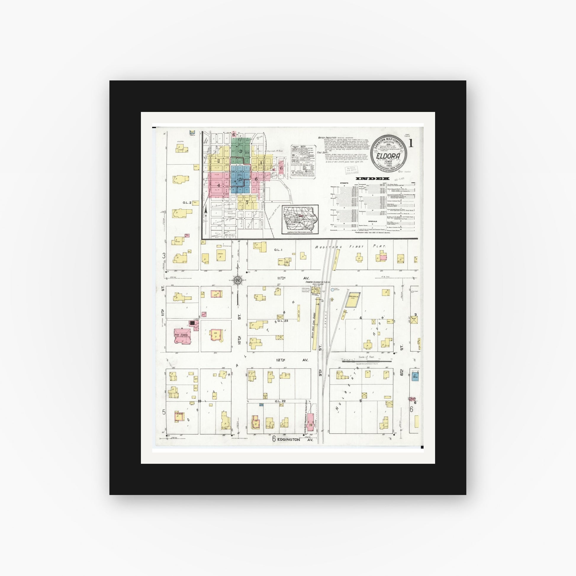Old map wall art mockup — black gallery frame with white mat — Sanborn Fire Insurance Map from Eldora, Hardin County, Iowa (1920) â€” Complete Set