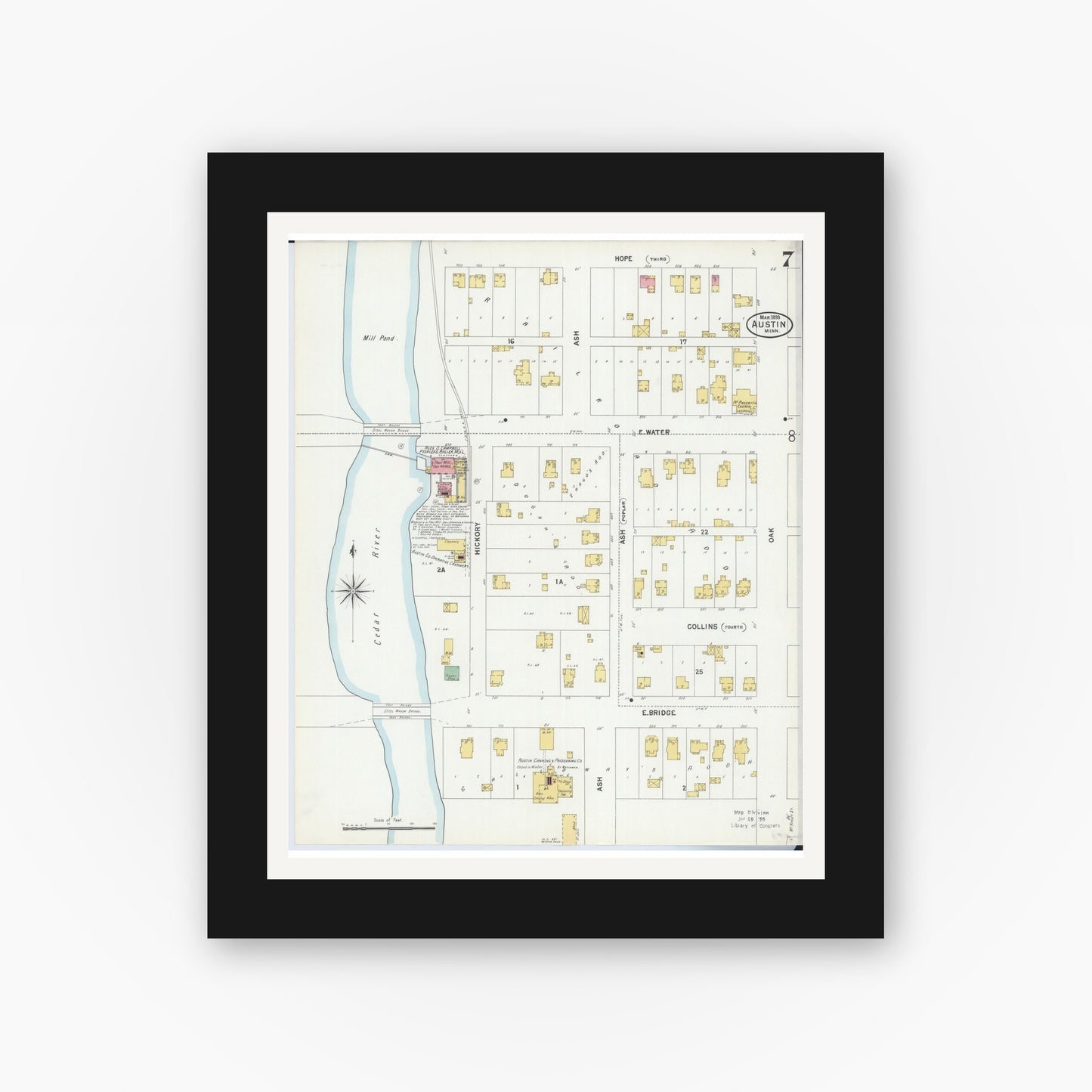 Old map wall art mockup — black gallery frame with white mat — Sanborn Fire Insurance Map from Austin, Mower County, Minnesota (1899), Sheet #0007
