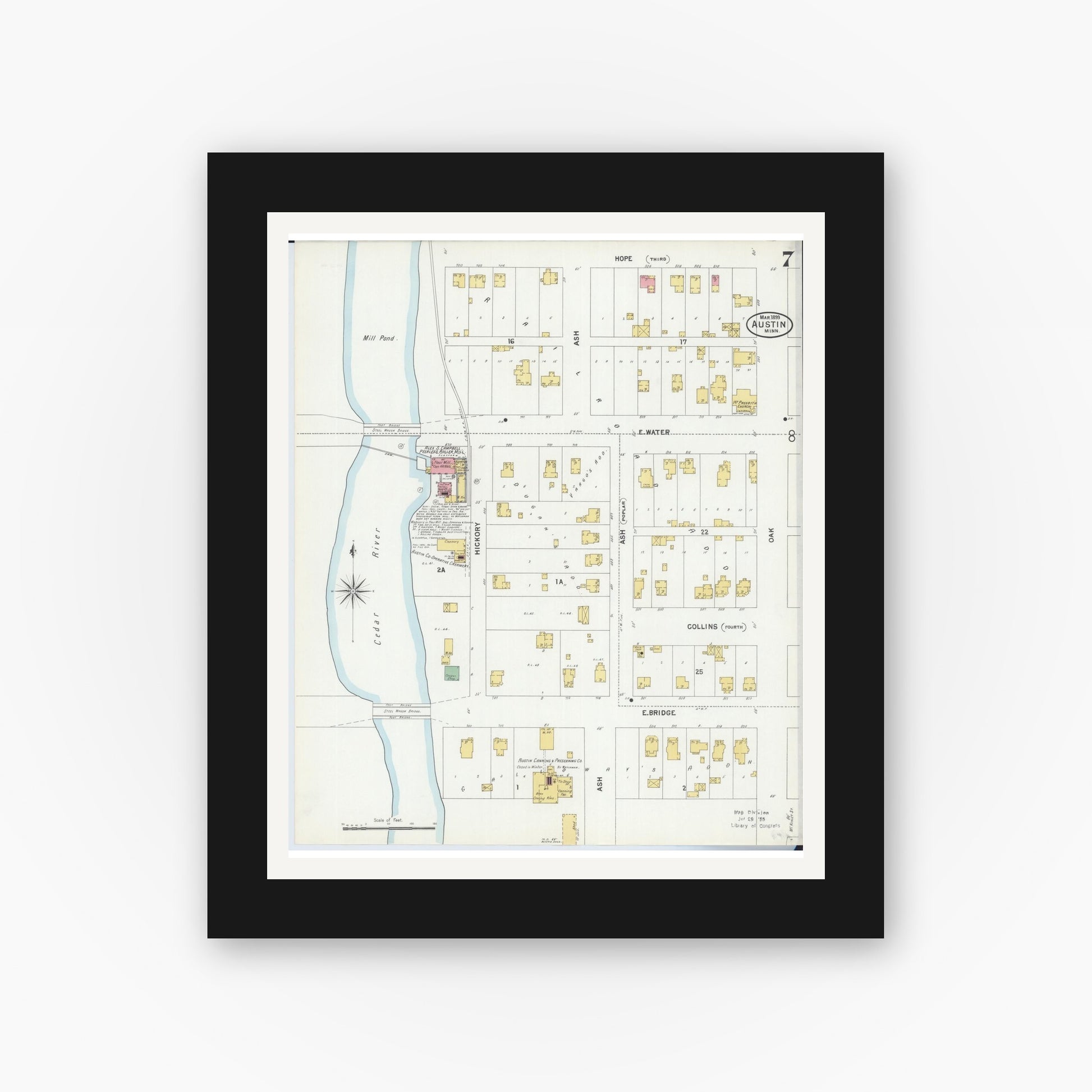 Old map wall art mockup — black gallery frame with white mat — Sanborn Fire Insurance Map from Austin, Mower County, Minnesota (1899), Sheet #0007