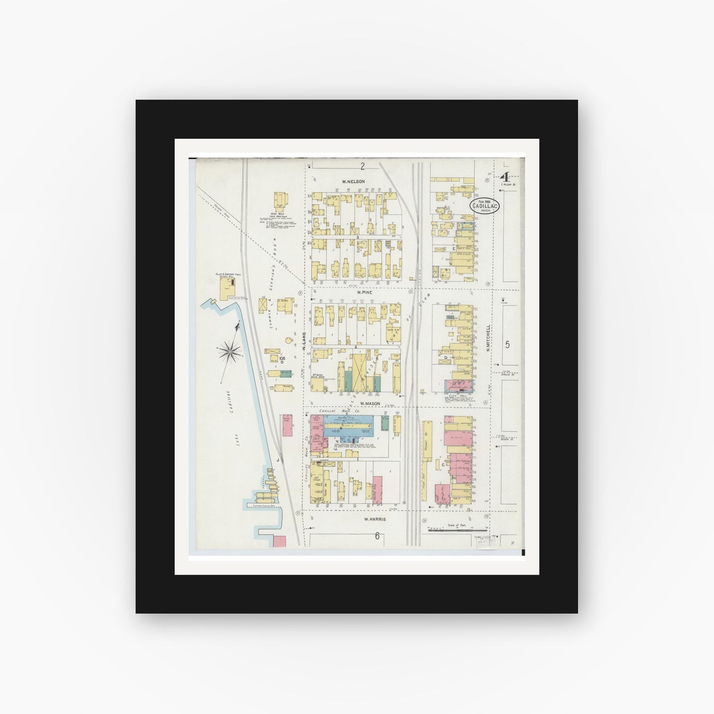Old map wall art mockup — black gallery frame with white mat — Sanborn Fire Insurance Map from Cadillac, Wexford County, Michigan (1906), Sheet #0004