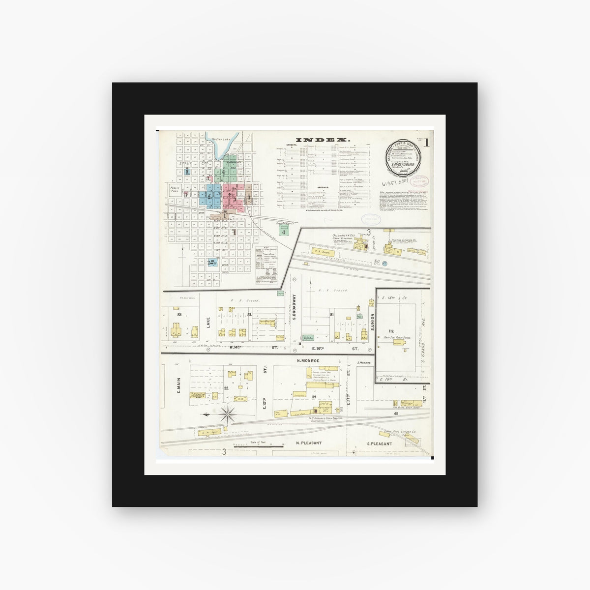Old map wall art mockup — black gallery frame with white mat — Sanborn Fire Insurance Map from Emmetsburg, Palo Alto County, Iowa (1897) â€” Complete Set
