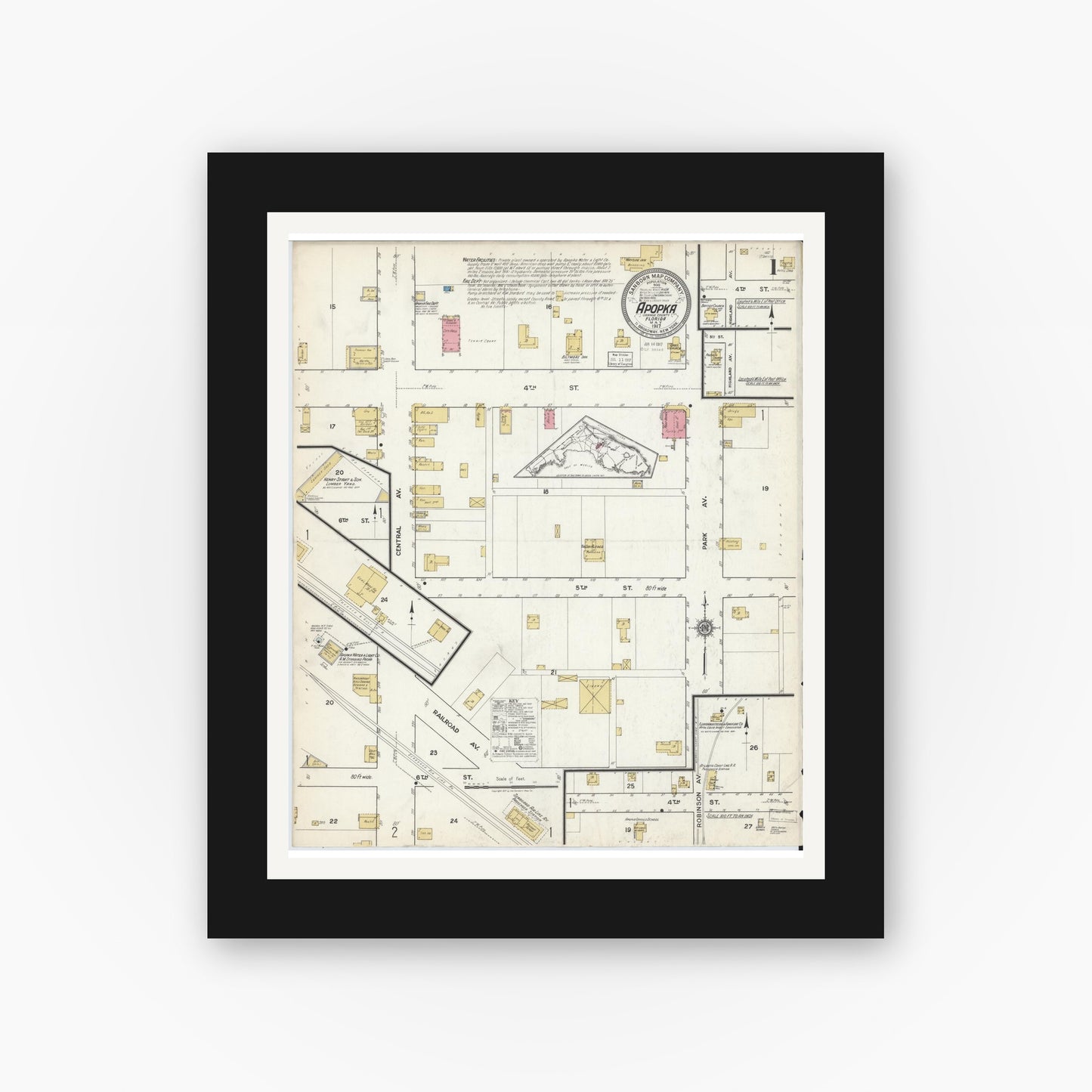 Old map wall art mockup — black gallery frame with white mat — Sanborn Fire Insurance Map from Apopka, Orange County, Florida (1917), Sheet #0001