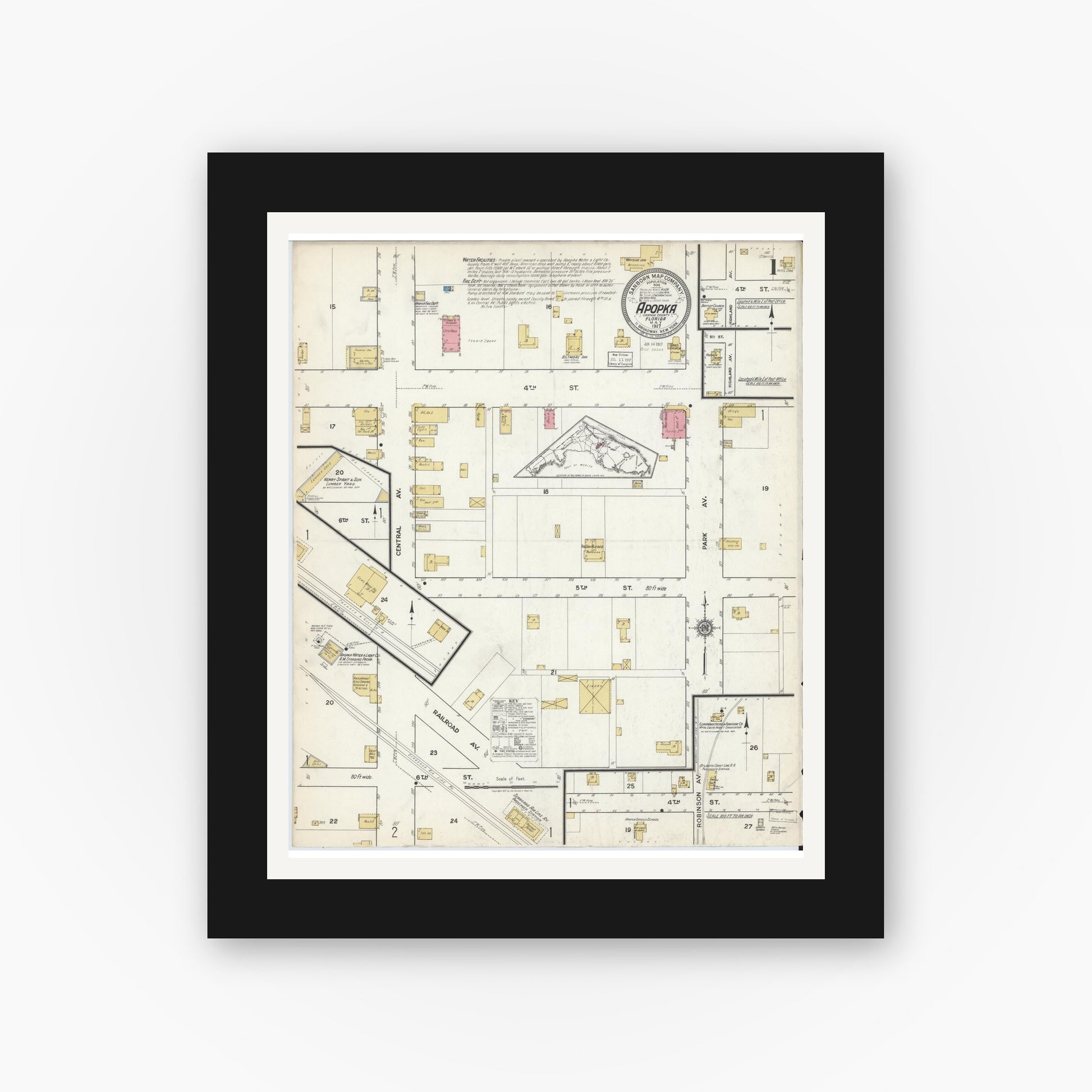 Old map wall art mockup — black gallery frame with white mat — Sanborn Fire Insurance Map from Apopka, Orange County, Florida (1917), Sheet #0001