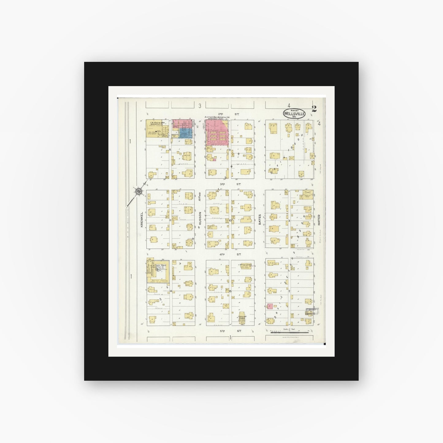Old map wall art mockup — black gallery frame with white mat — Sanborn Fire Insurance Map from Wellsville, Montgomery County, Missouri (1917), Sheet #0002