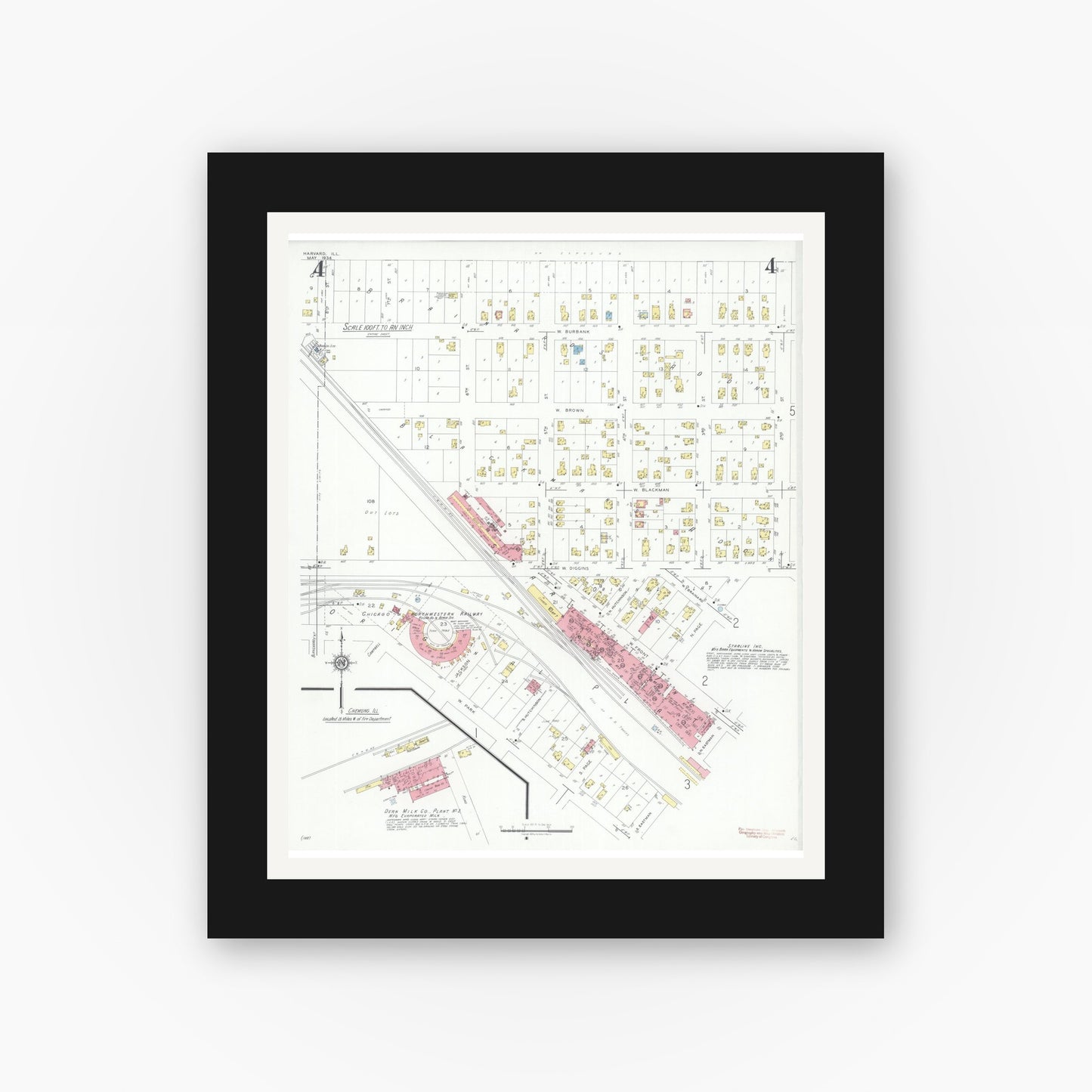 Old map wall art mockup — black gallery frame with white mat — Sanborn Fire Insurance Map from Harvard, McHenry County, Illinois (1934), Sheet #0004