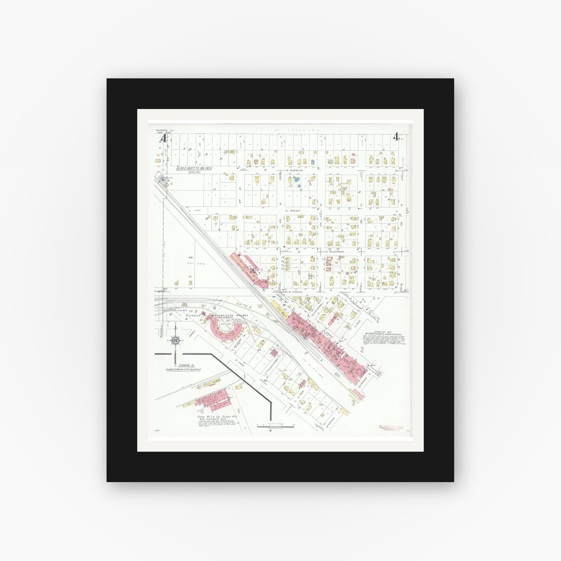 Old map wall art mockup — black gallery frame with white mat — Sanborn Fire Insurance Map from Harvard, McHenry County, Illinois (1934), Sheet #0004