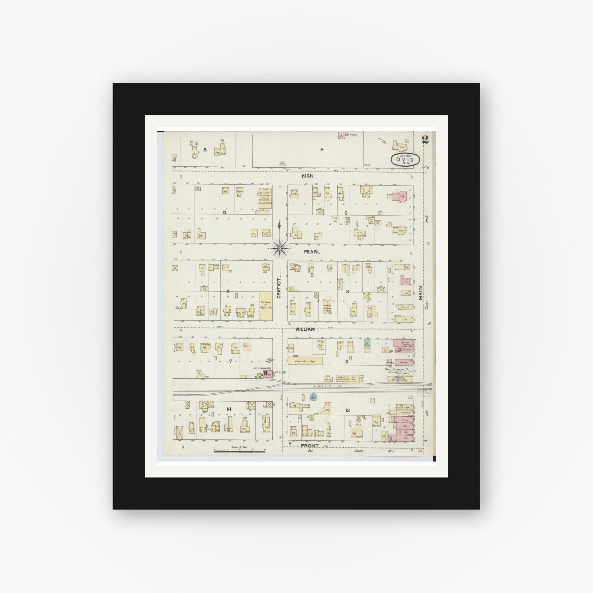 Old map wall art mockup — black gallery frame with white mat — Sanborn Fire Insurance Map from Ovid, Clinton County, Michigan (1890), Sheet #0002