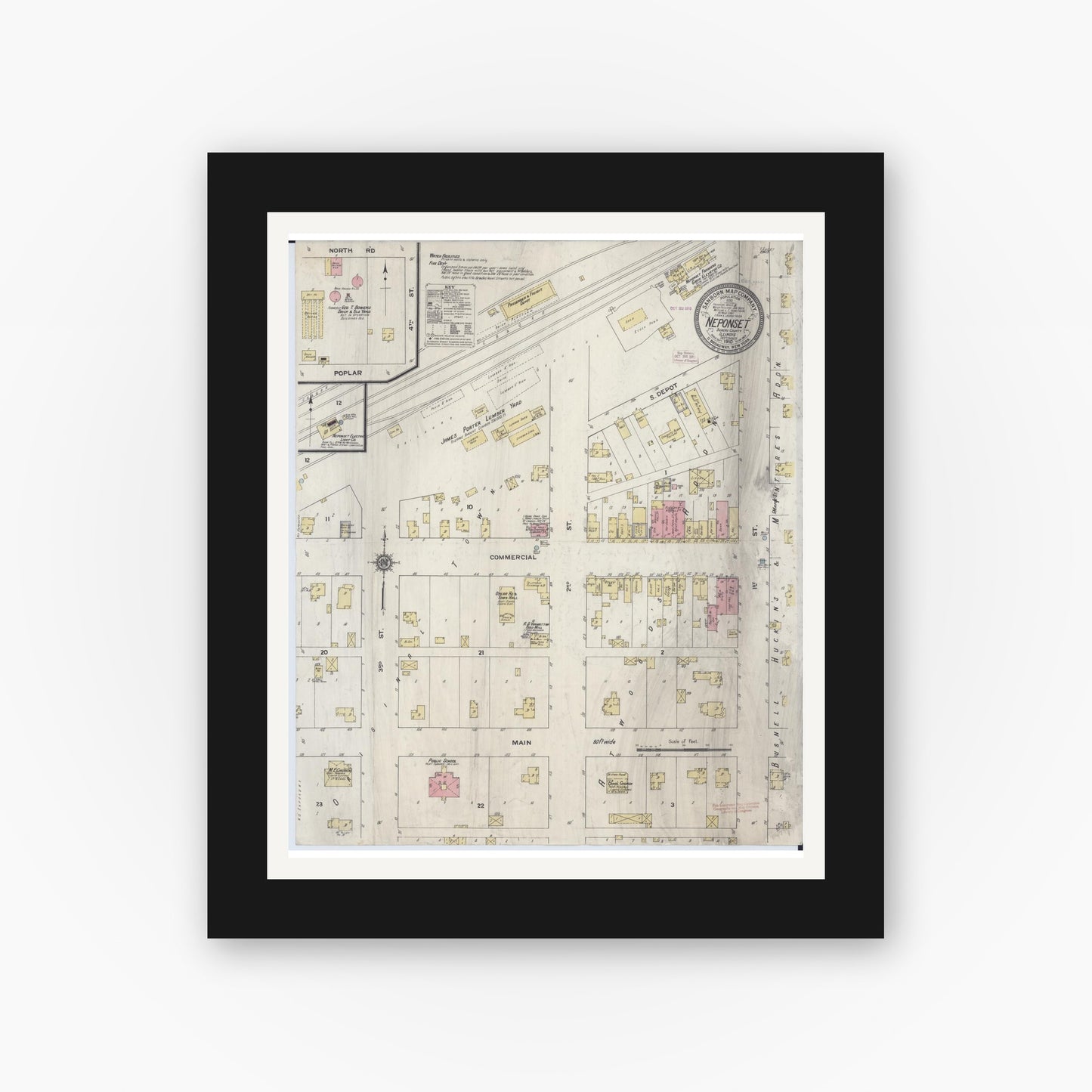 Old map wall art mockup — black gallery frame with white mat — Sanborn Fire Insurance Map from Neponset, Bureau County, Illinois (1910), Sheet #0001