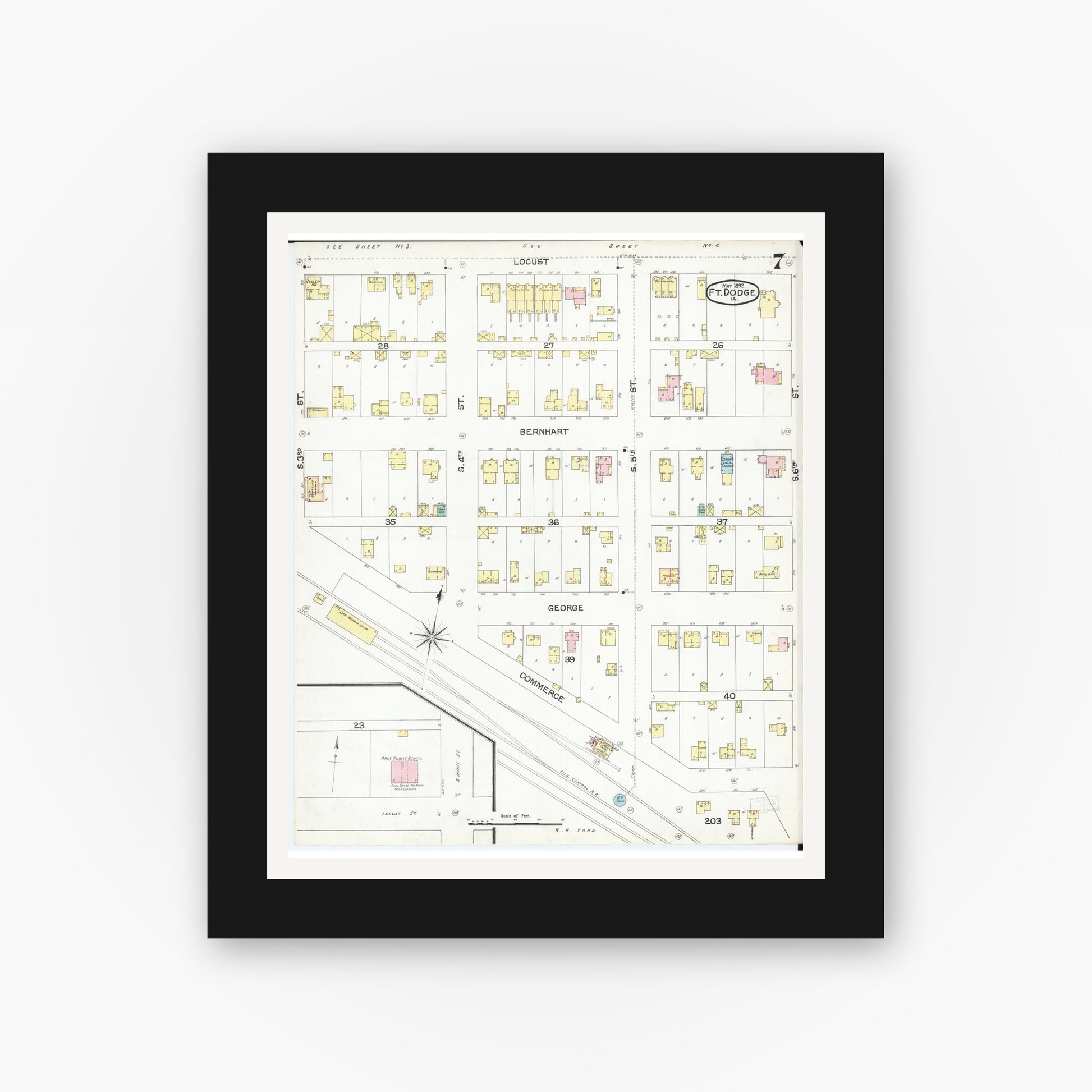 Old map wall art mockup — black gallery frame with white mat — Sanborn Fire Insurance Map from Fort Dodge, Webster County, Iowa (1892), Sheet #0007