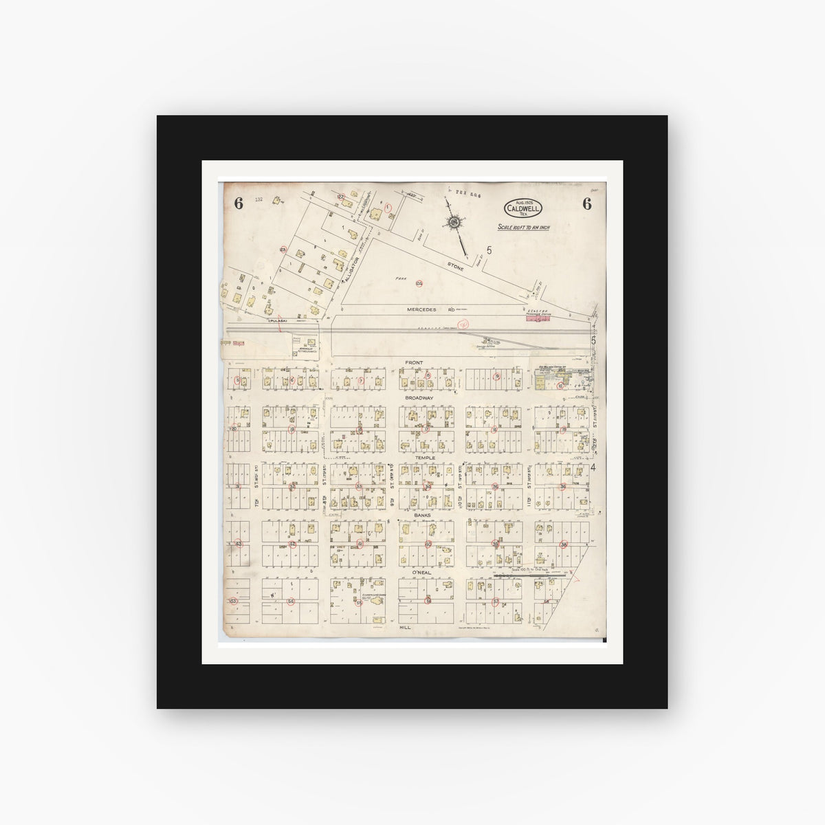 Old map wall art mockup — black gallery frame with white mat — Sanborn Fire Insurance Map from Caldwell, Burleson County, Texas (1943), Sheet #0006