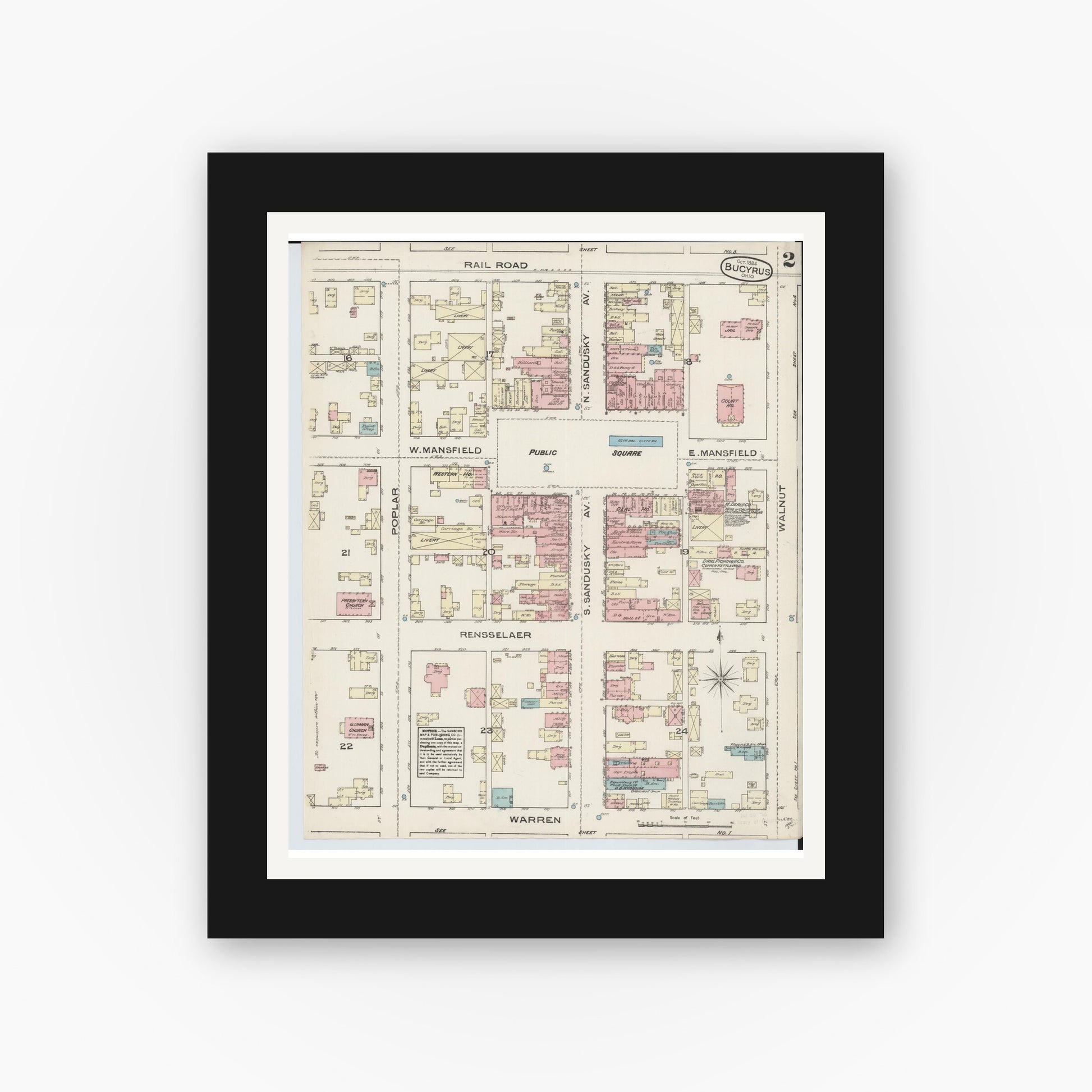 Old map wall art mockup — black gallery frame with white mat — Sanborn Fire Insurance Map from Bucyrus, Crawford County, Ohio (1884), Sheet #0002
