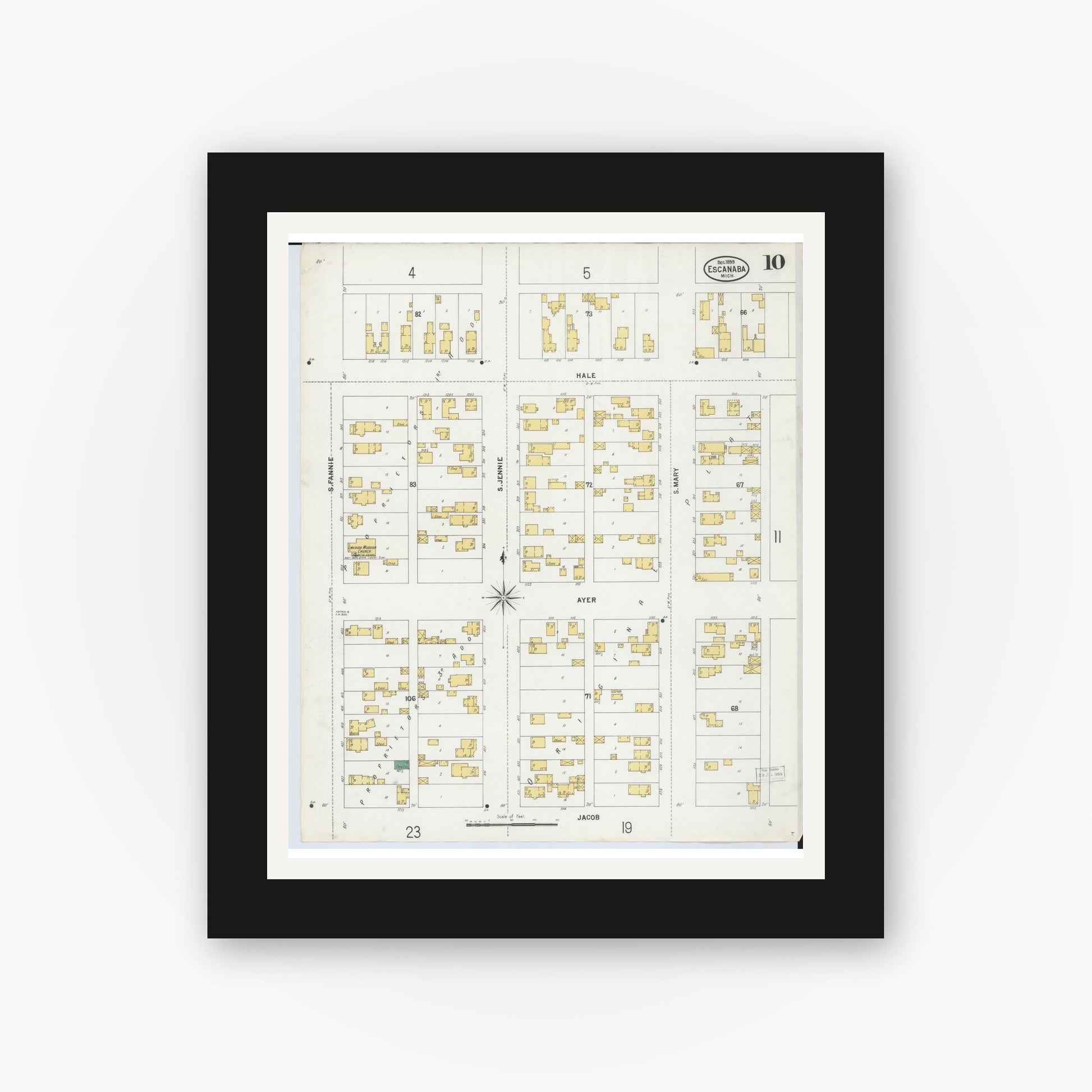 Old map wall art mockup — black gallery frame with white mat — Sanborn Fire Insurance Map from Escanaba, Delta County, Michigan (1899), Sheet #0010