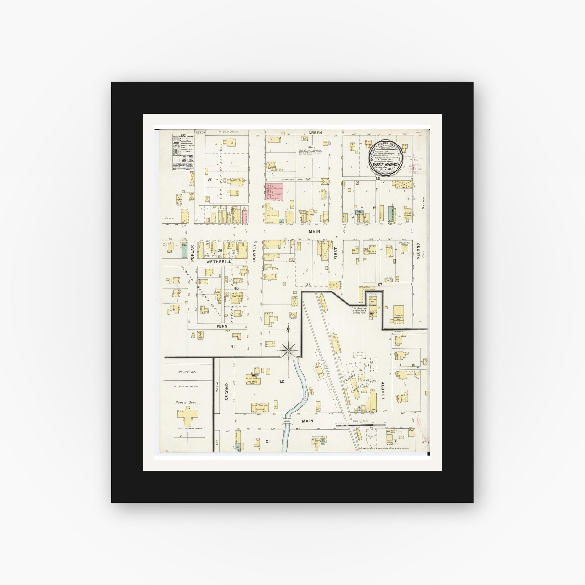Old map wall art mockup — black gallery frame with white mat — Sanborn Fire Insurance Map from West Branch, Cedar County, Iowa (1895), Sheet #0001